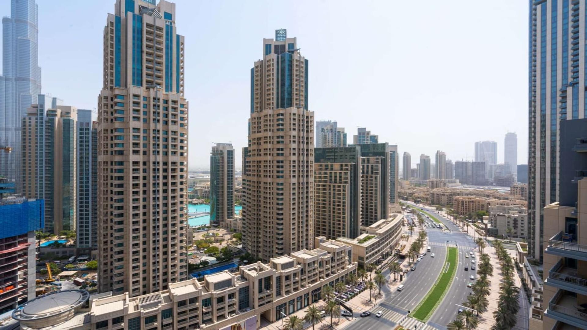 Skyscraper view from 3-bedroom apartment in Boulevard Crescent, Downtown Dubai for rent
