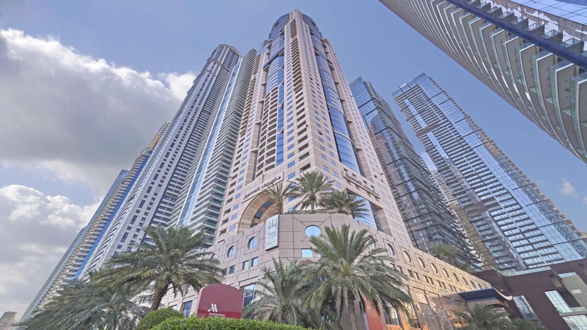 Spacious living area in two-bed hotel apartment, Marriott Harbour, Dubai Marina, for rent