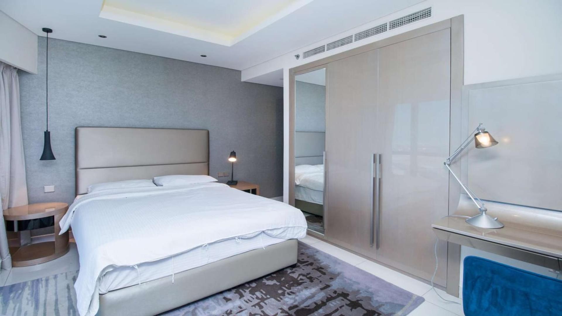 Modern dining area in luxury three-bedroom apartment, Damac Towers, Business Bay, Dubai