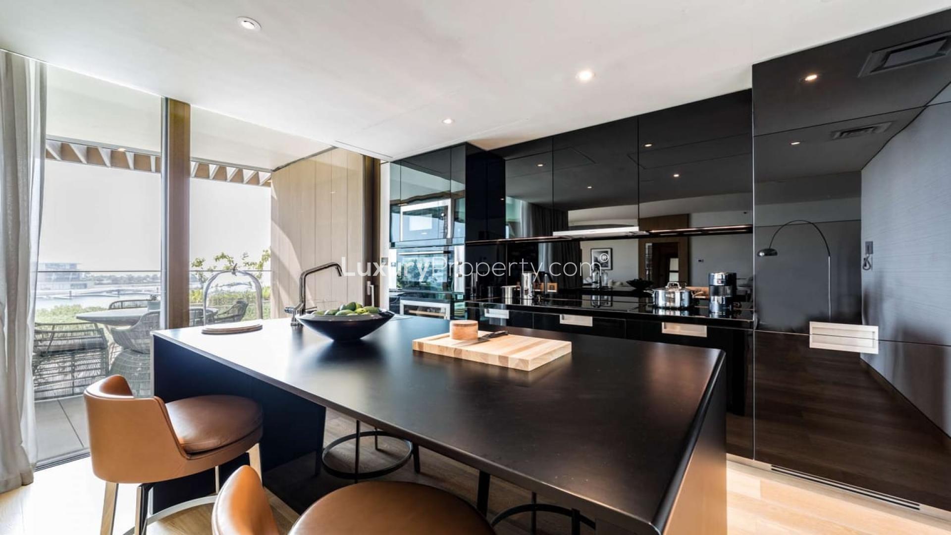Luxury apartment dining and living area with sea view in Jumeirah Bay Island