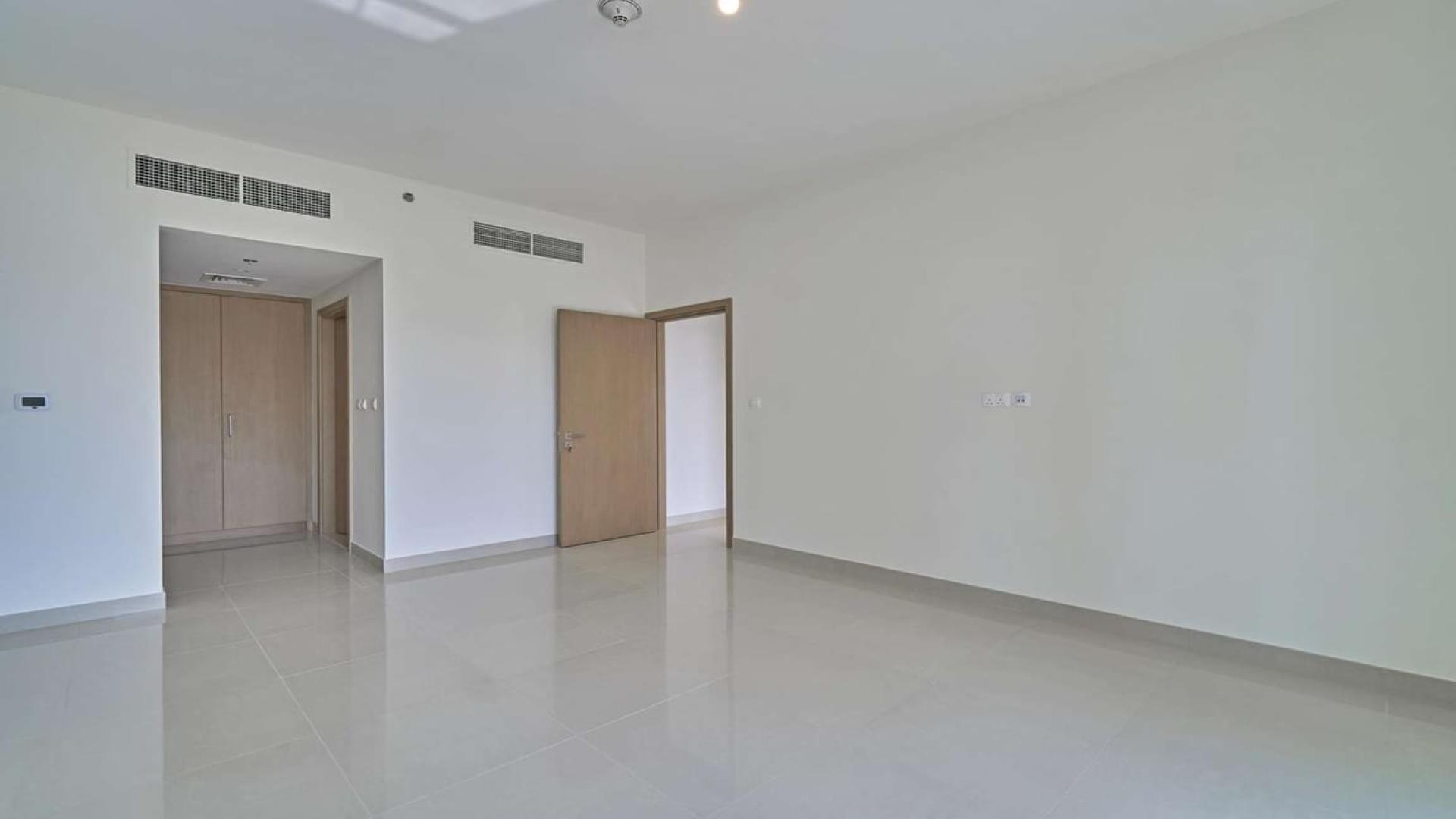 Aerial view of Dubai Creek Harbour apartments and street in Harbour Views 1 community