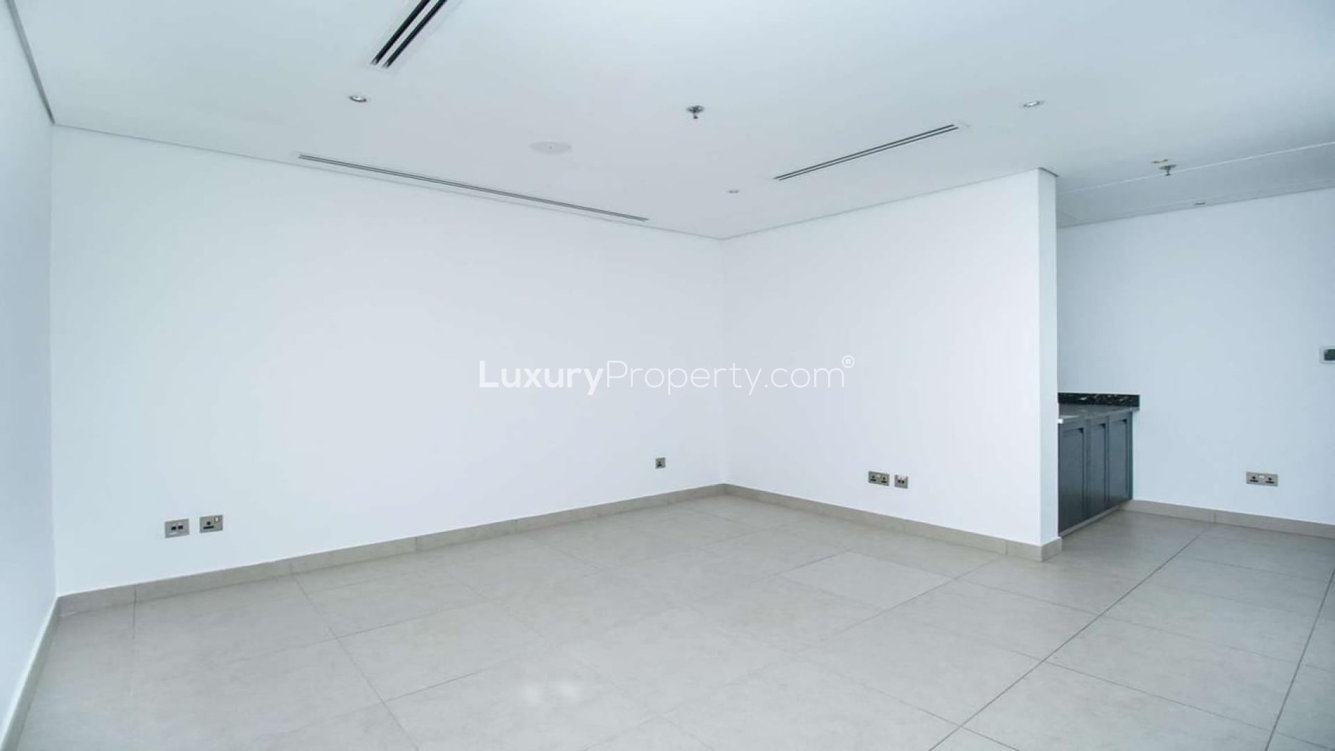 Playground and modern apartment buildings in Jumeirah Heights Cluster A, Dubai