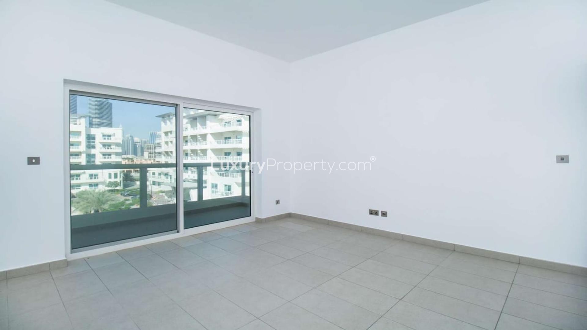 Modern apartment complex with pool in Jumeirah Heights, Cluster D, available for rent