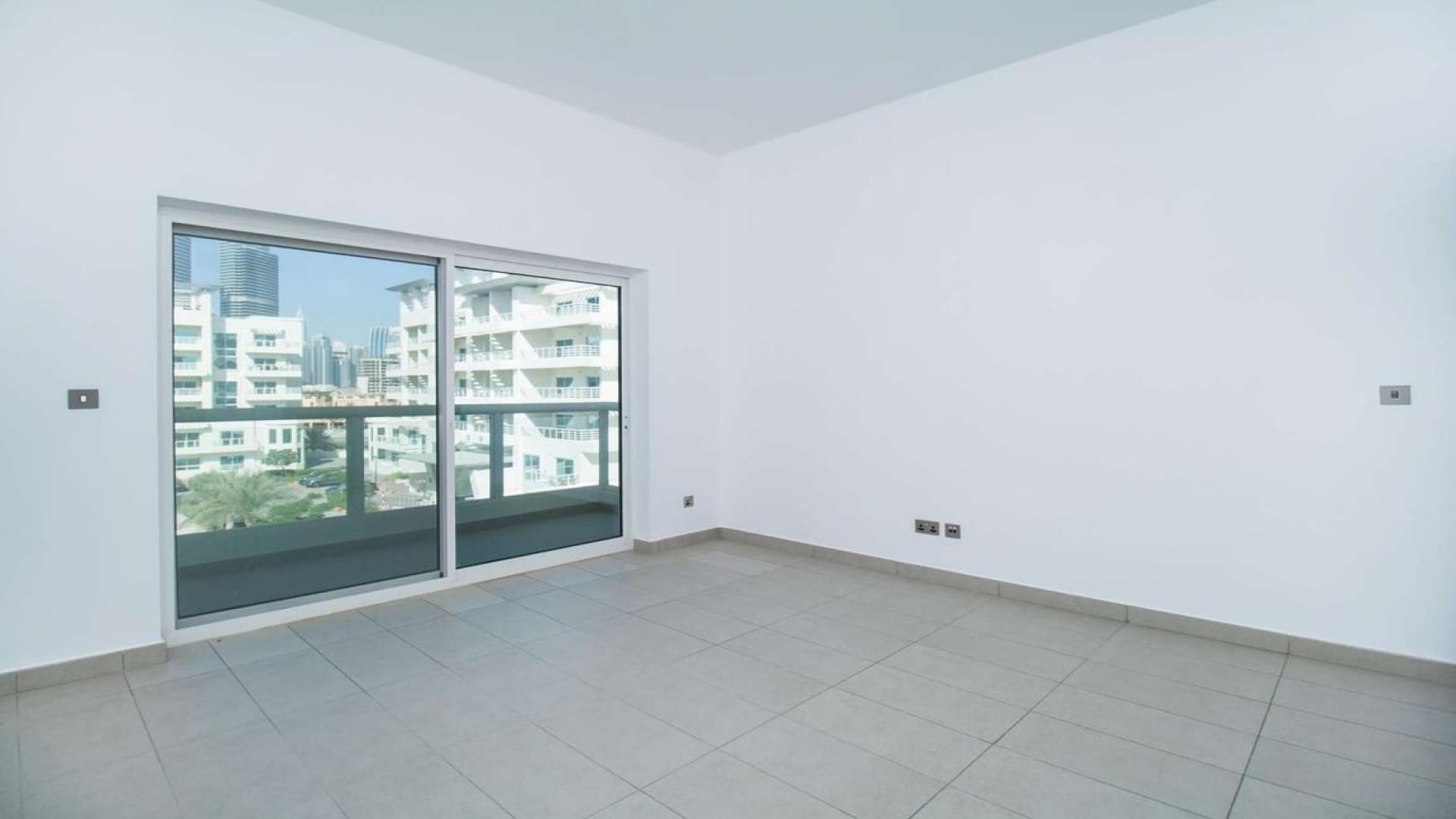 Modern apartment complex with pool in Jumeirah Heights, Cluster D, available for rent