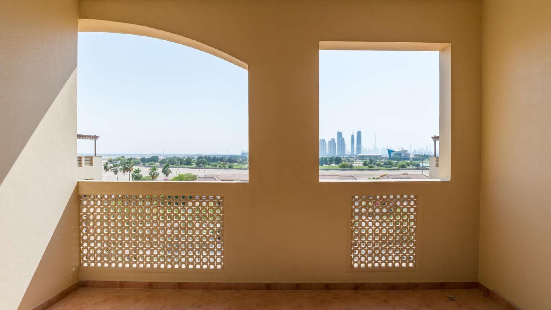 Spacious living room in golf-facing 3-bedroom apartment, Al Badia Residences, Dubai Festival City