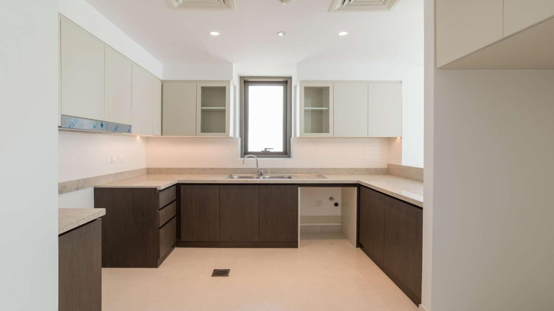 Spacious living room with balcony view in Creekside 18 apartment, Dubai Creek Harbour