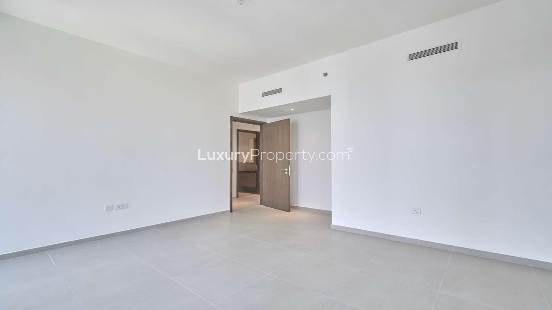 Spacious living room with floor-to-ceiling windows in BLVD Heights, Downtown Dubai apartment