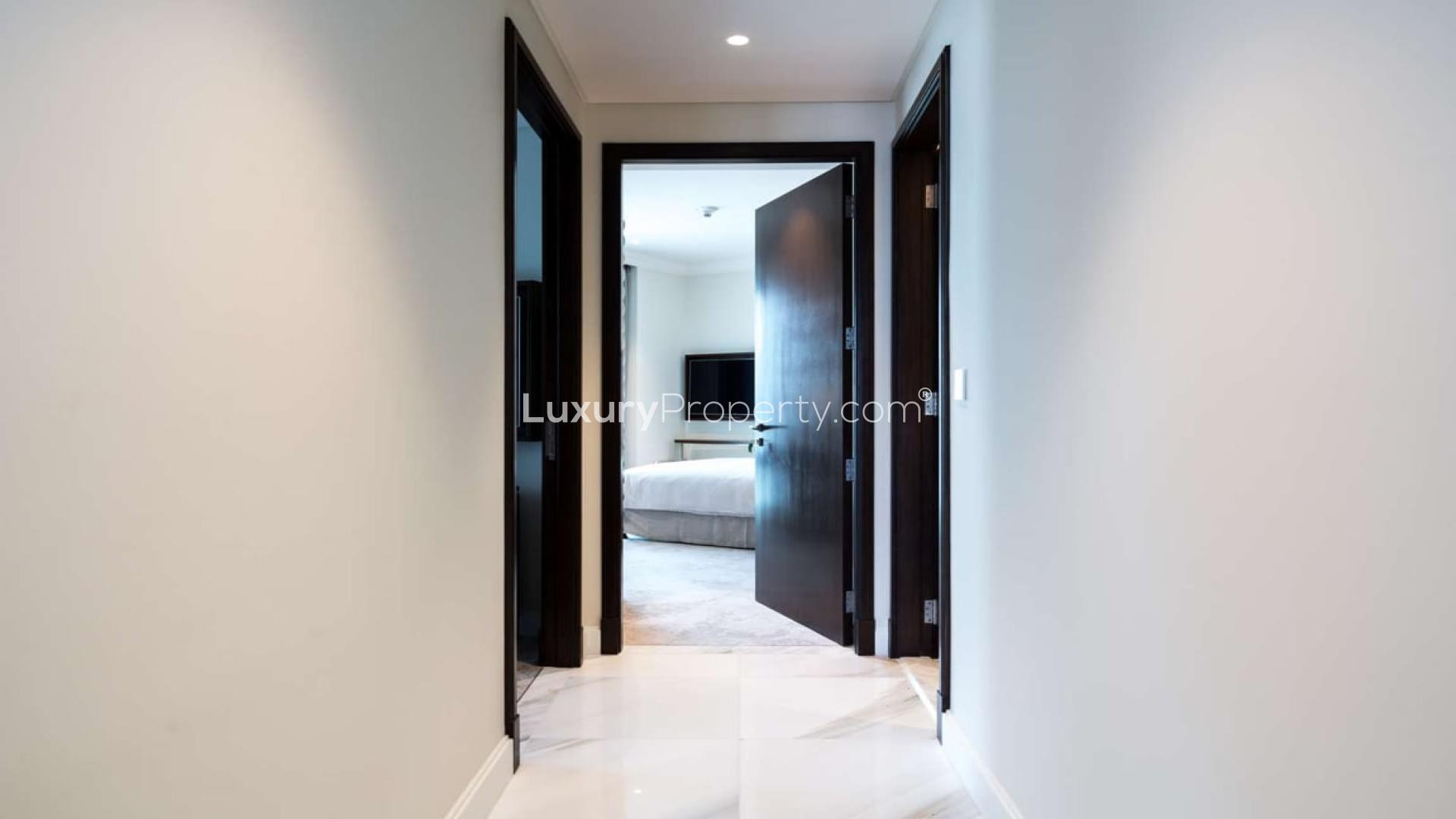 Luxurious living room in Downtown Dubai apartment with stunning city views, elegant decor