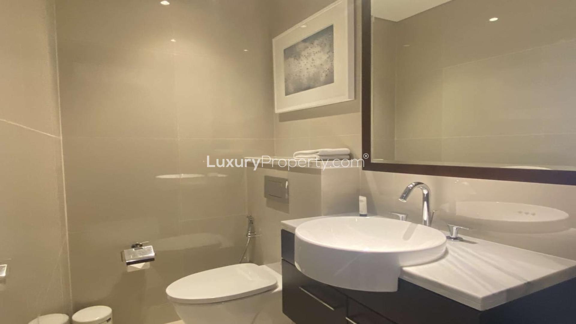 Luxury living room in Downtown Dubai apartment with Burj Khalifa views, The Address Sky View Towers