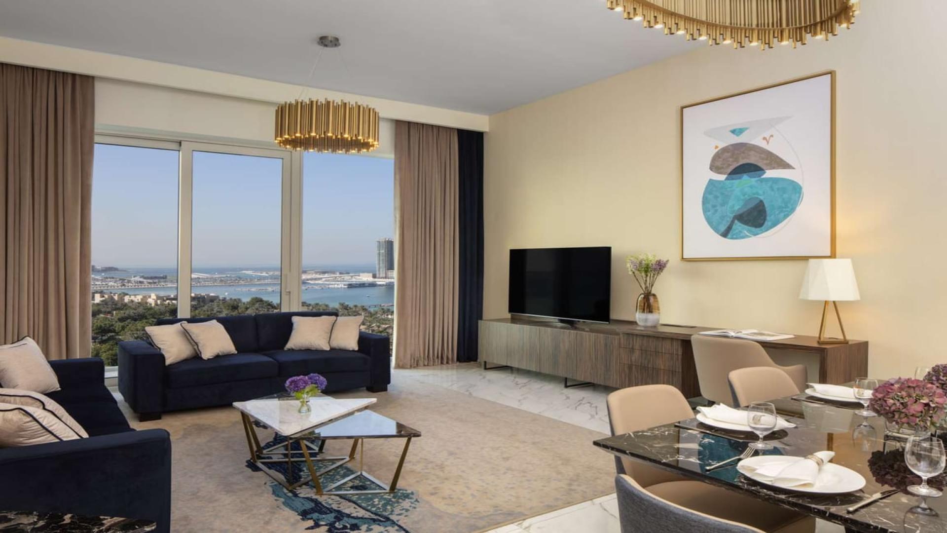 Furnished bedroom with stunning Dubai skyline views, Avani Palm View Hotel & Suites apartment