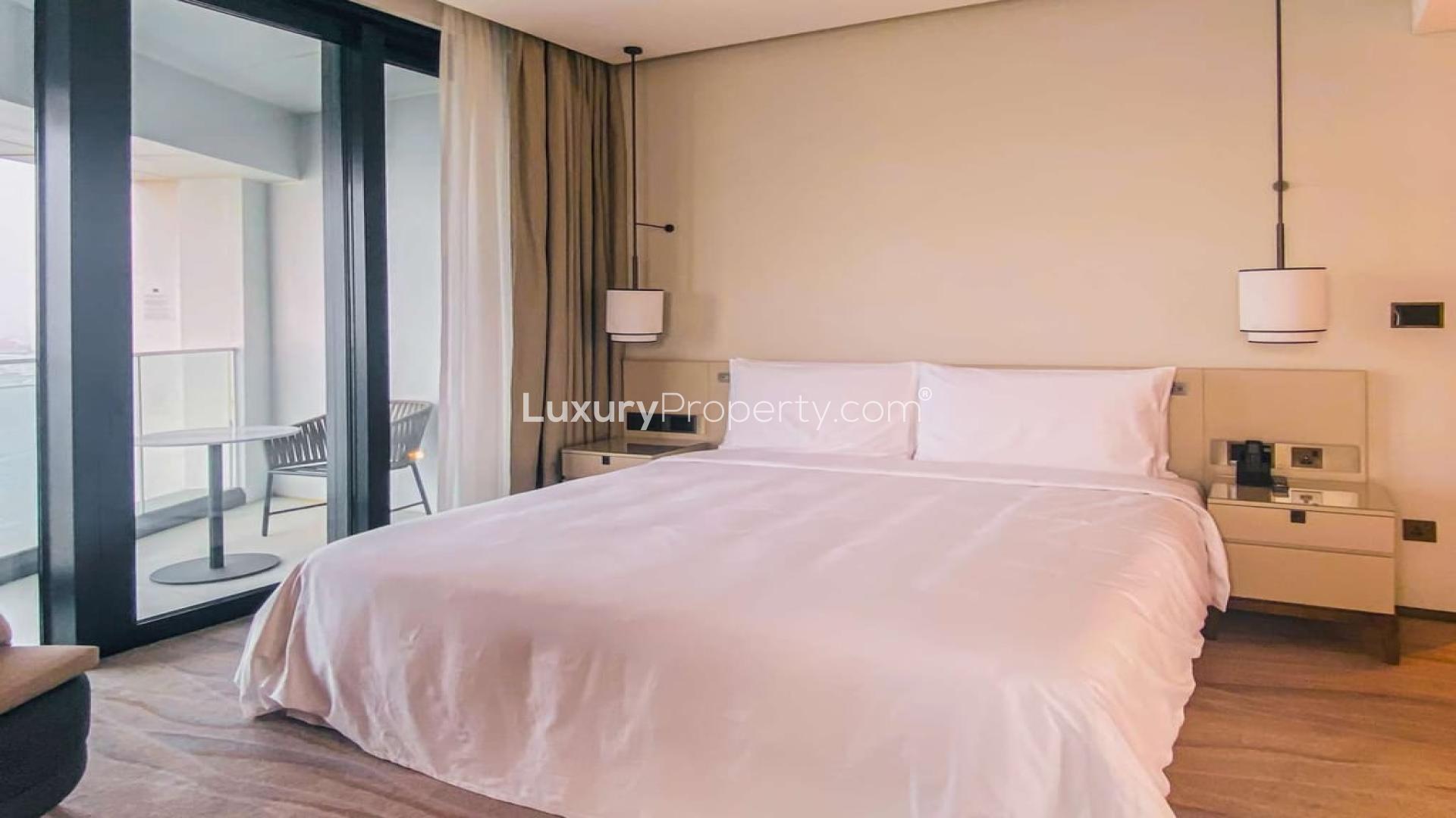 Modern living room in serviced apartment, Jumeirah Beach Residence, with elegant furniture and decor