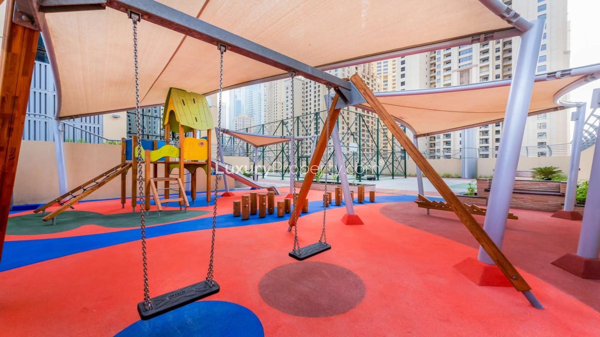 Bright living room with large windows in JAM Marina Residence, Dubai Marina apartment