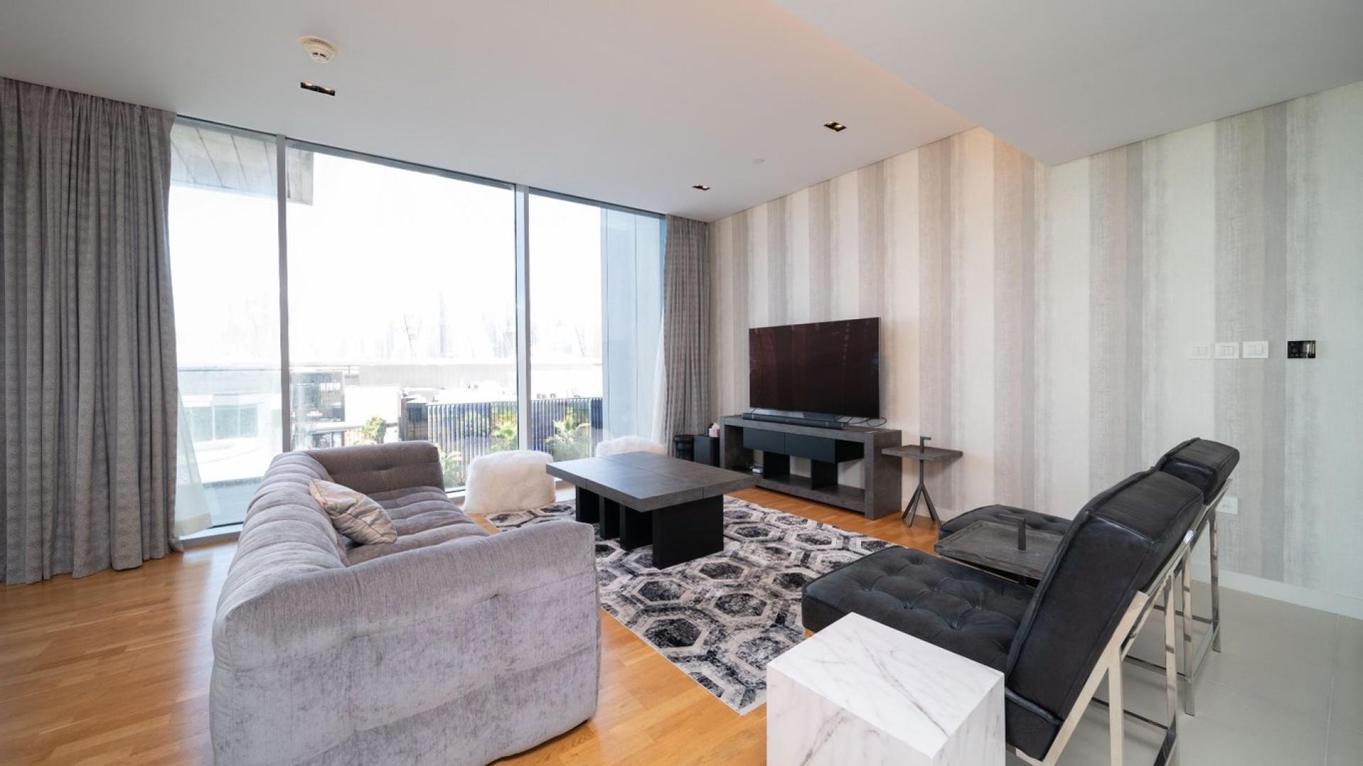 View of Bluewaters Island with iconic Ferris wheel and modern architecture