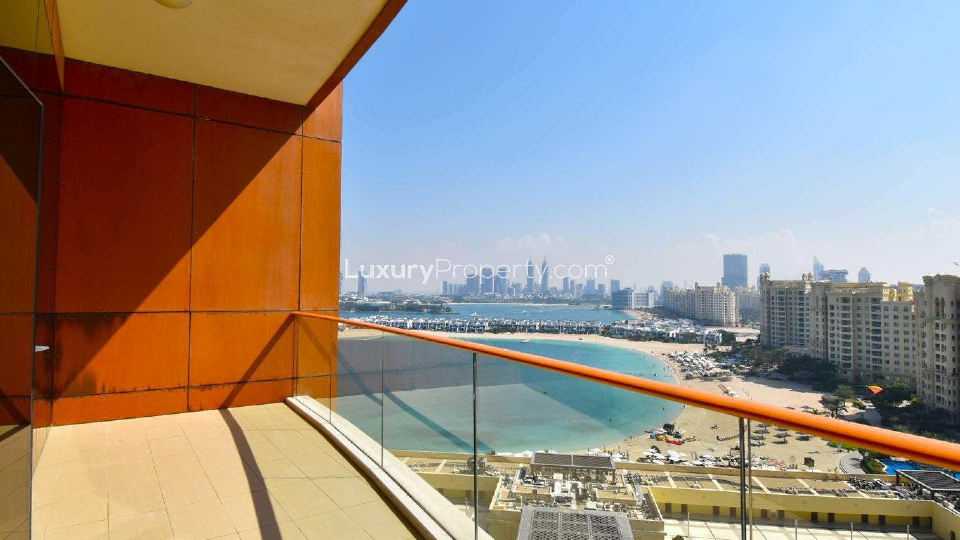 Spacious living room with large windows and sea views in Tiara Residences, Palm Jumeirah