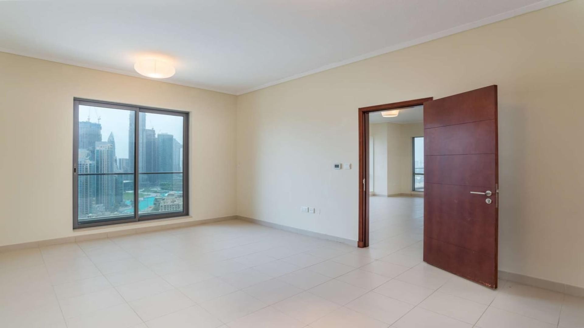 Modern kitchen in 3-bedroom apartment, Southridge, Downtown Dubai, with granite countertops and city view