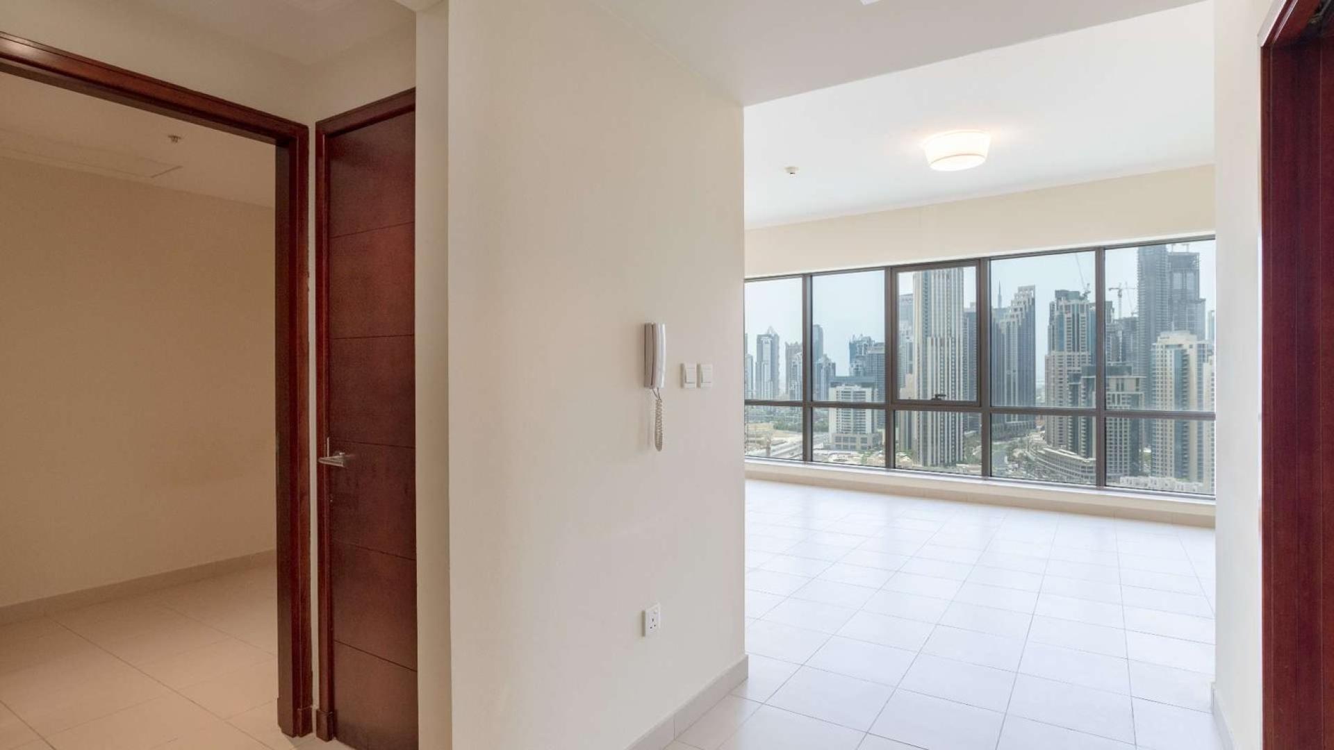 Spacious living room with city views in Southridge apartment, Downtown Dubai