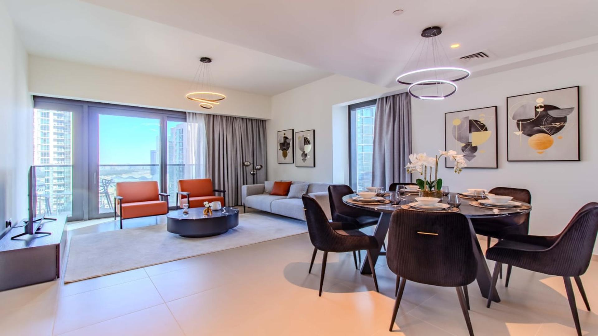 Balcony view from 3-bed apartment in Downtown Dubai with Burj Khalifa and cityscape