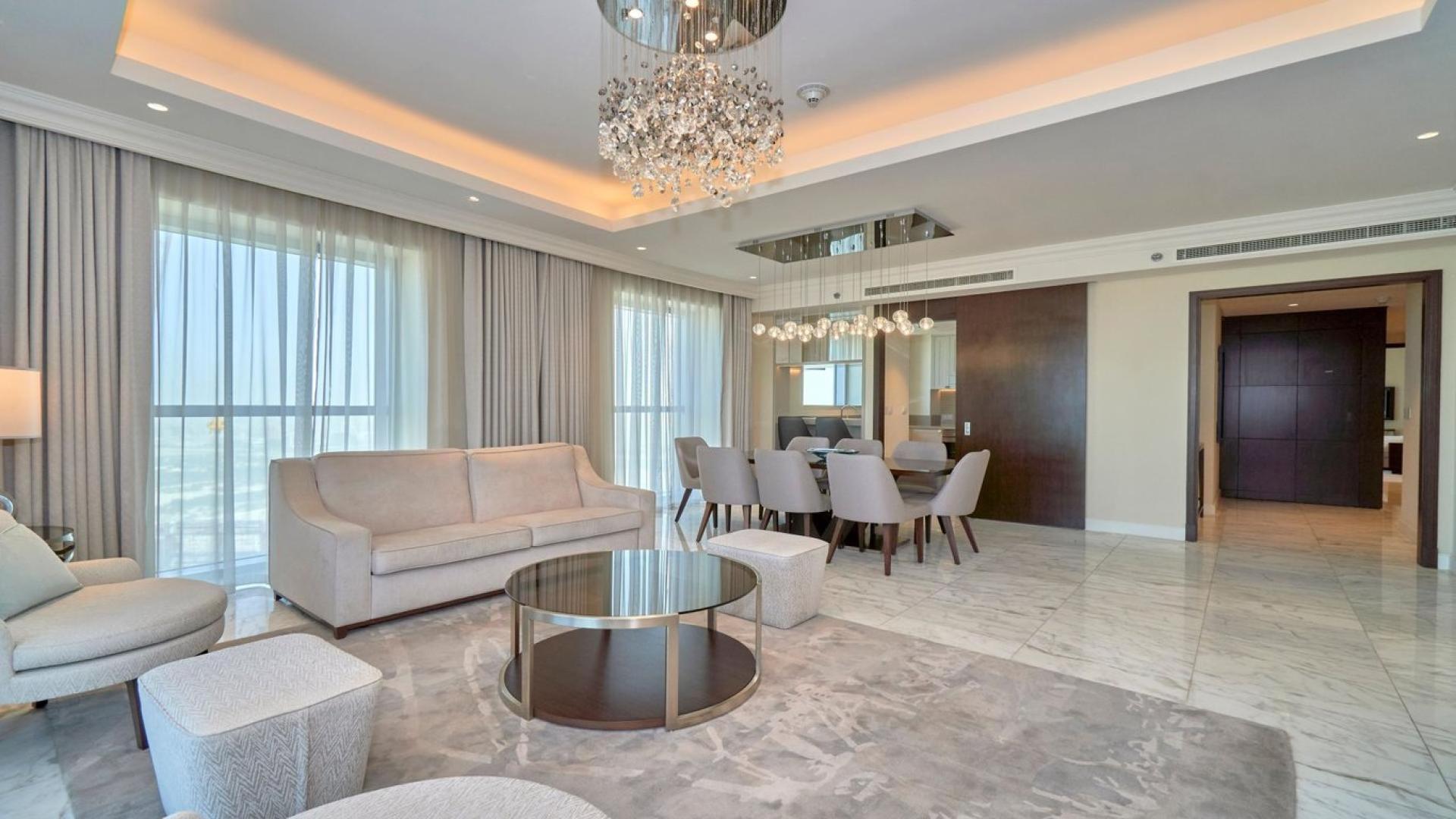 Furnished living room in Sky Collection Apartment, Downtown Dubai, with city views and modern decor