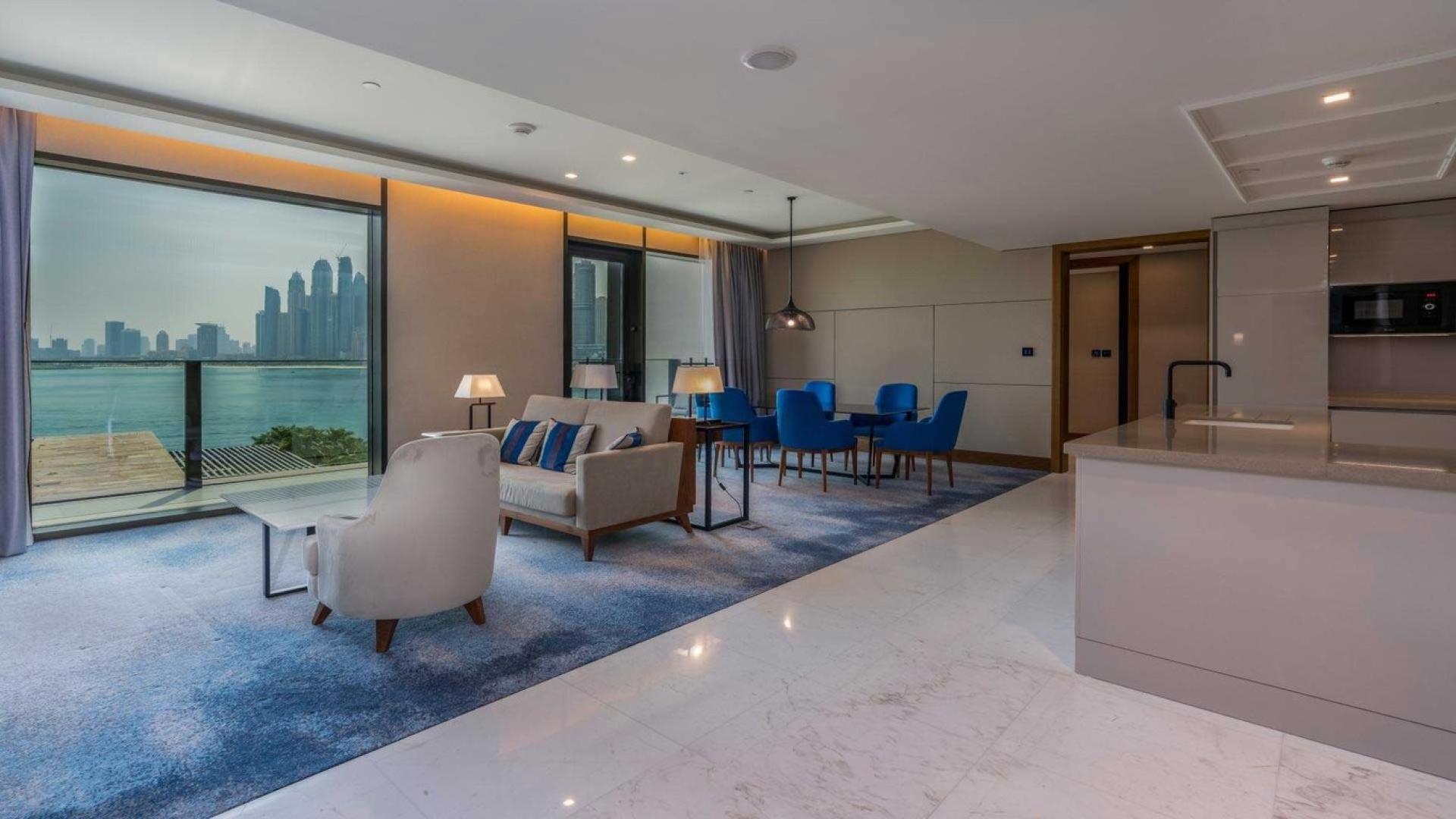 Balcony view from 3-bedroom apartment at Caesars Bluewaters Dubai overlooking waterfront and skyline