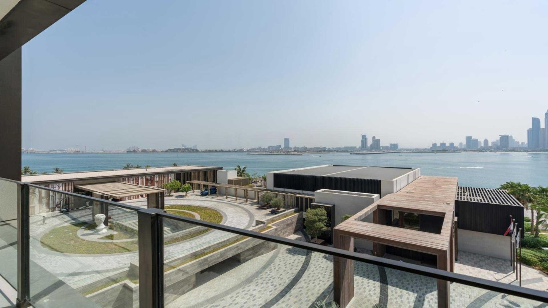 Living room with modern decor and sea view at Bluewaters Dubai apartment