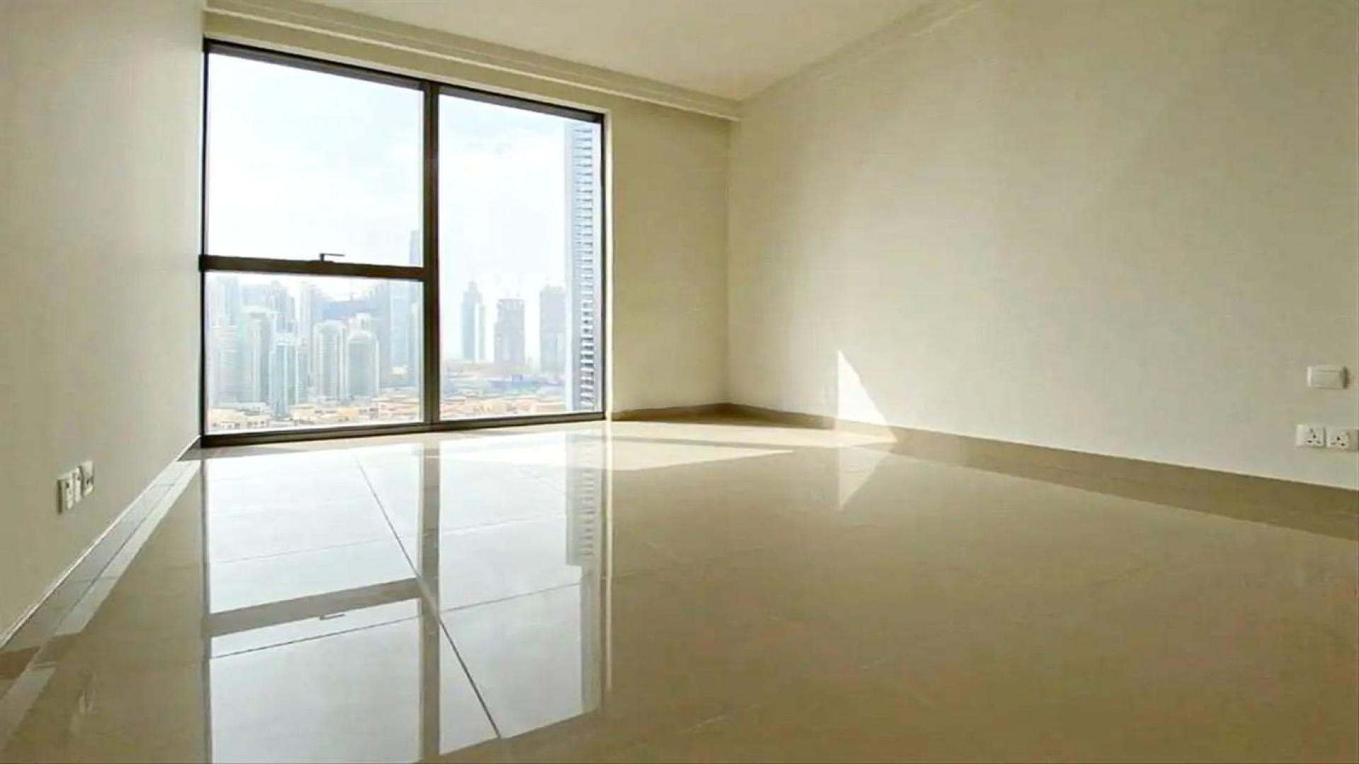 High-floor apartment bedroom with built-in wooden wardrobe, Boulevard Point, Downtown Dubai