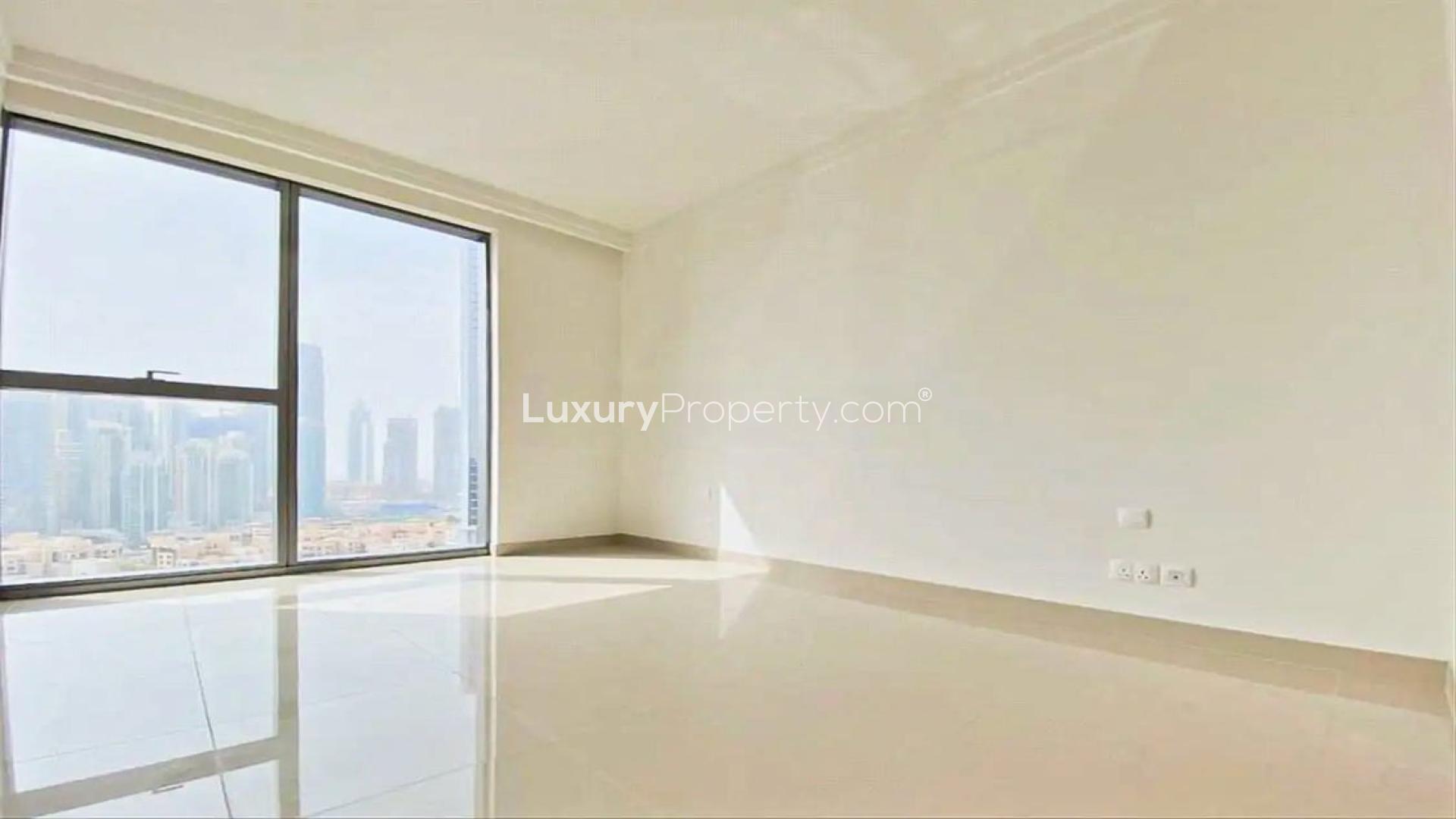 High-floor apartment balcony view of Downtown Dubai skyline from Boulevard Point
