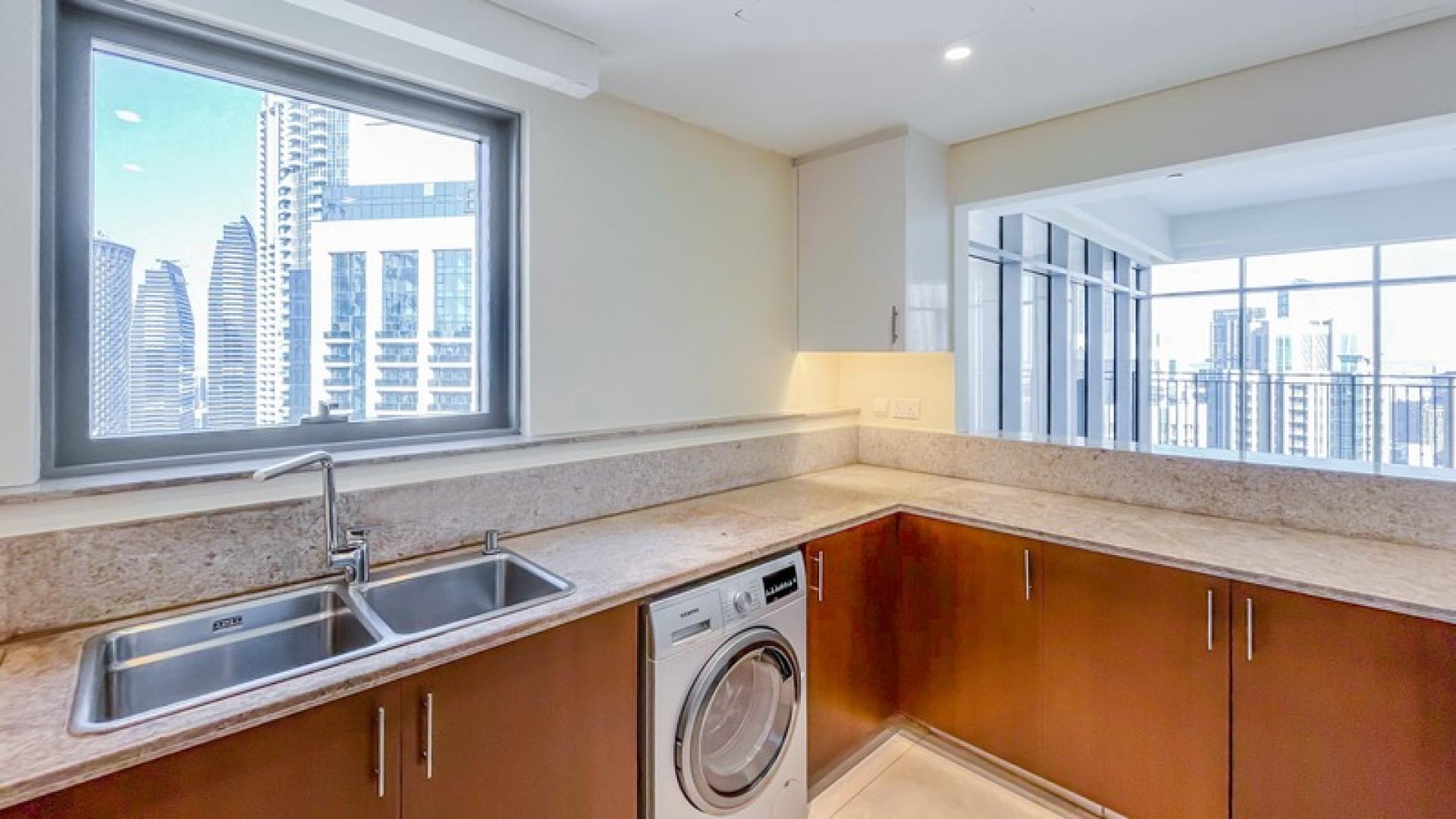 Spacious modern kitchen in high-floor corner apartment, Downtown Dubai, BLVD Crescent