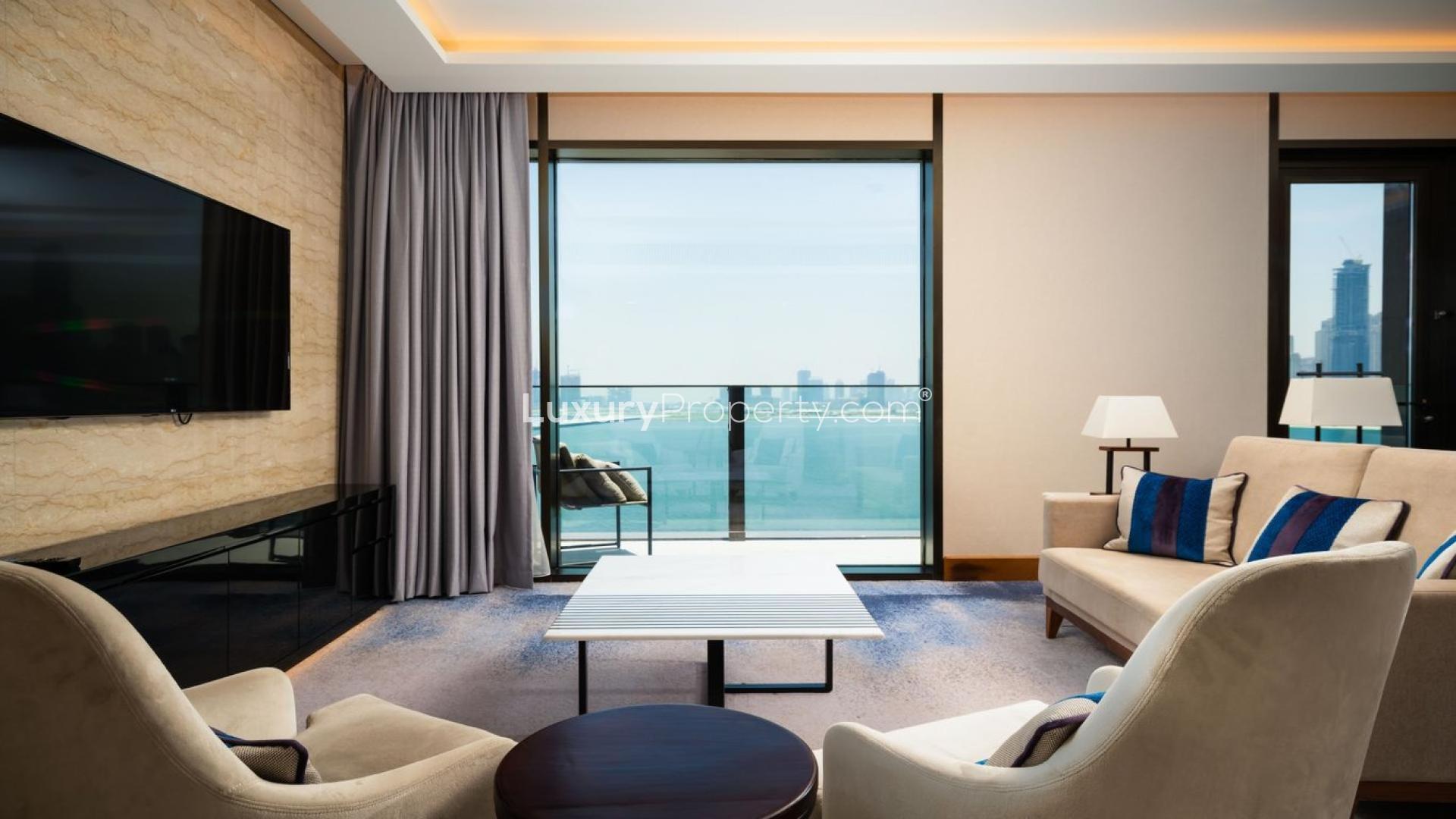 Modern living room in 3-bedroom apartment, Caesars Resort Bluewaters, Dubai. Spacious and stylish design