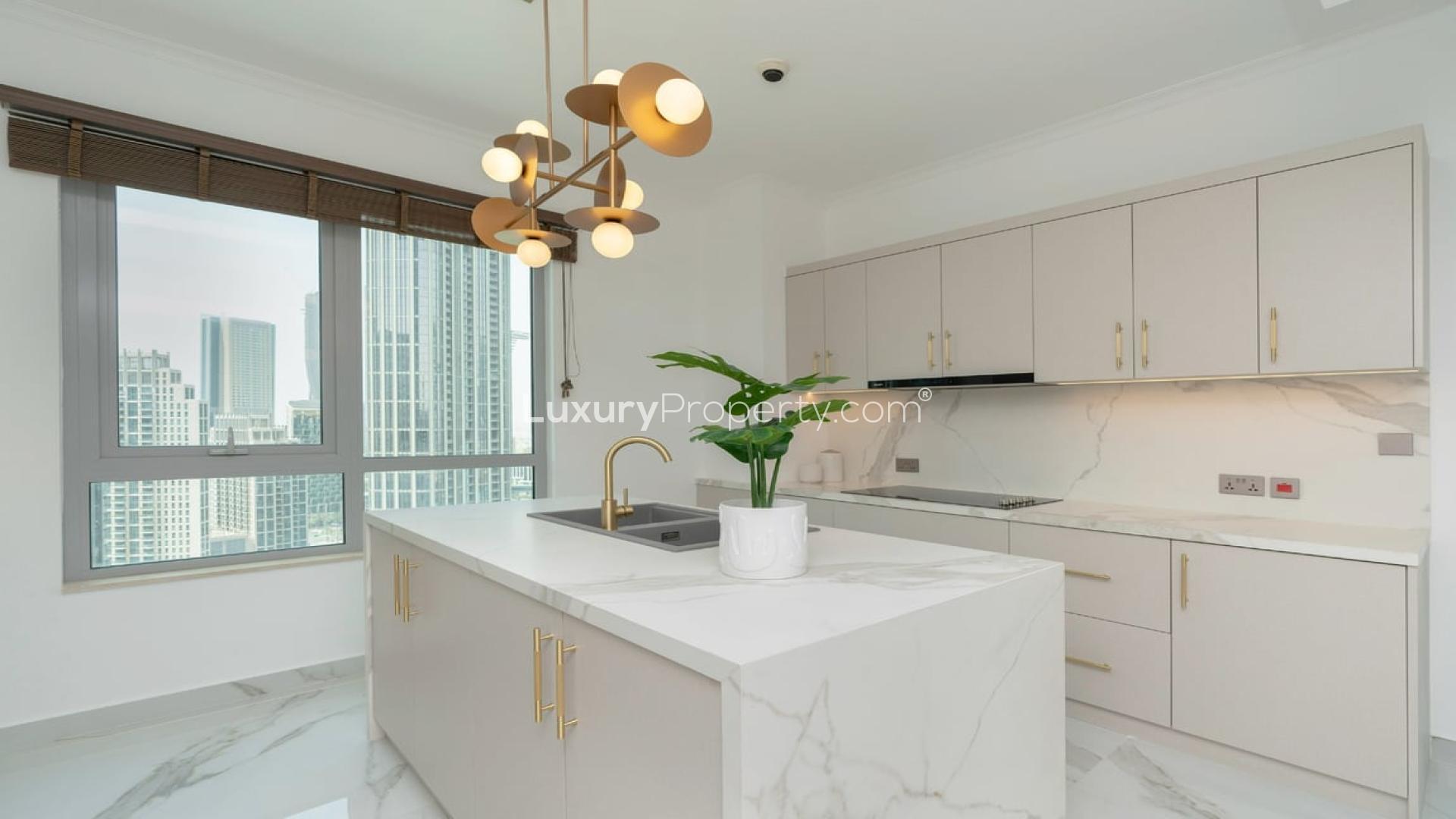 Modern living room and dining area in upgraded Downtown Dubai apartment with Burj Khalifa view