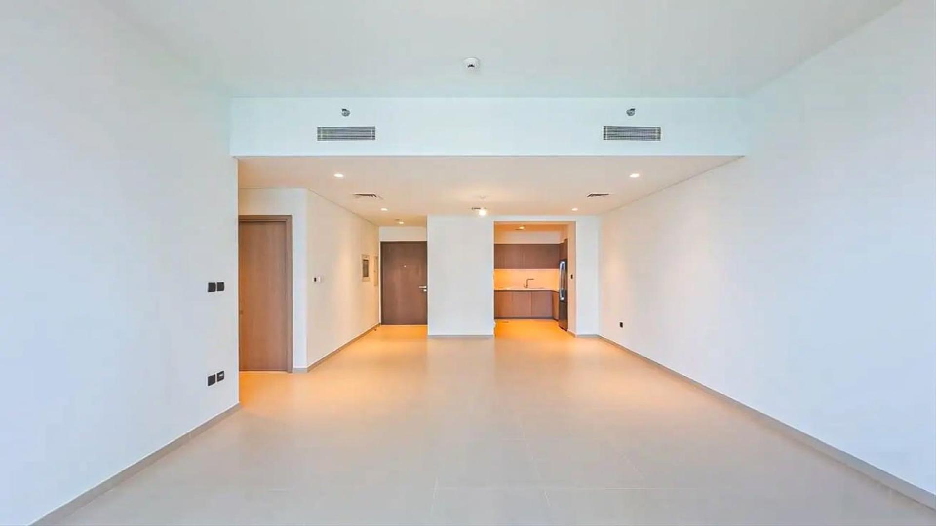 High-floor apartment living room with large windows in Opera District, Downtown Dubai