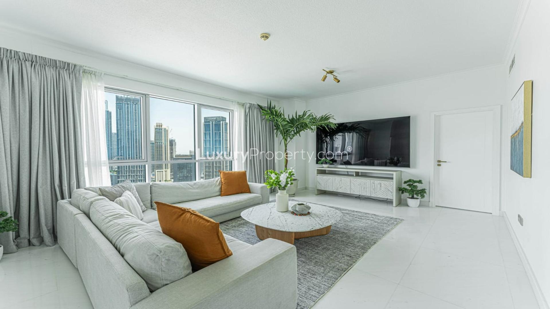 Spacious Downtown Dubai apartment living room with marble flooring and Burj Khalifa view