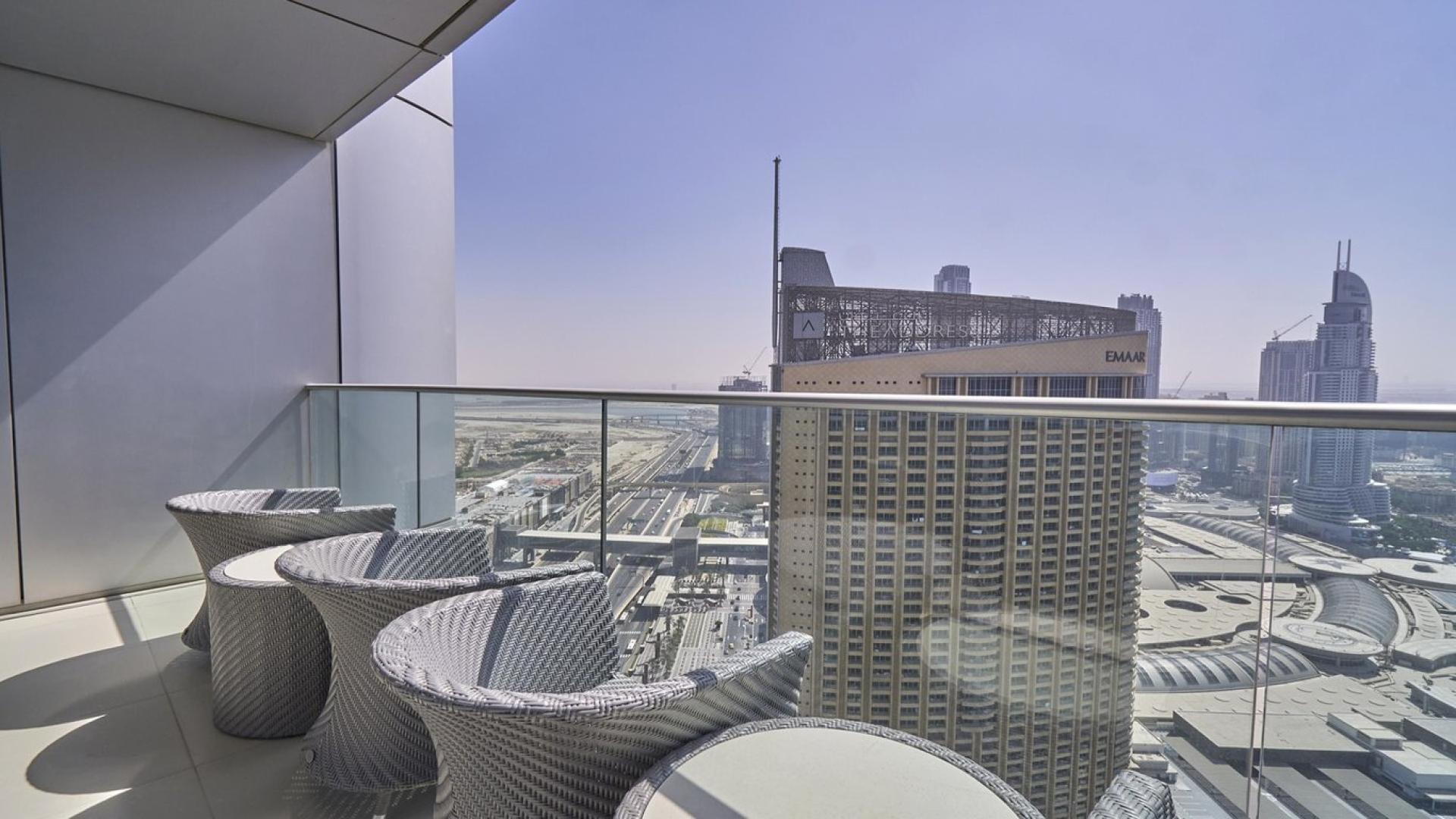 Luxury living room in spacious 3-bedroom apartment, The Address BLVD, Downtown Dubai