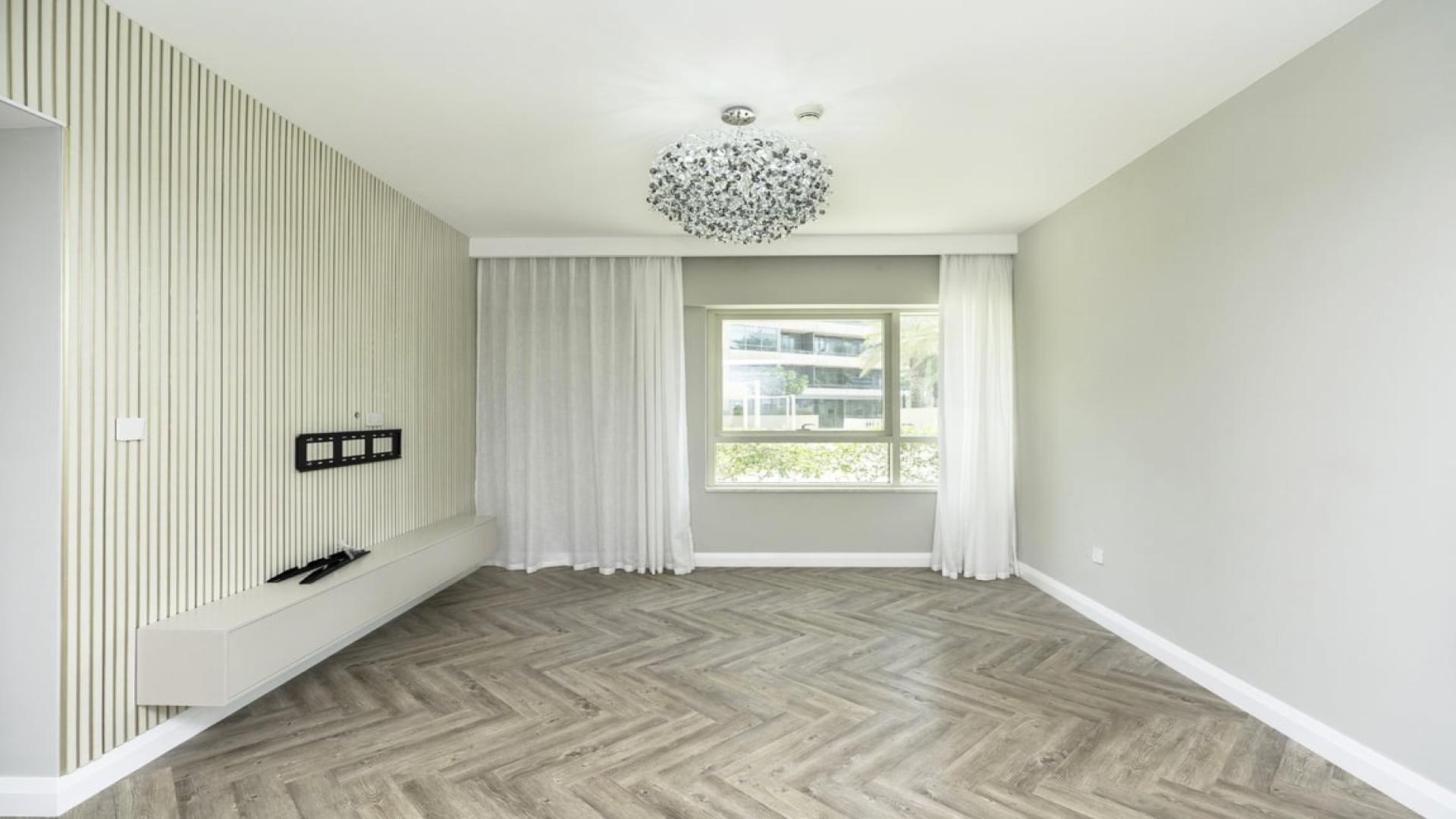 Rooftop pool and lounge area in luxury Al Sahab apartment, Dubai Marina skyline view