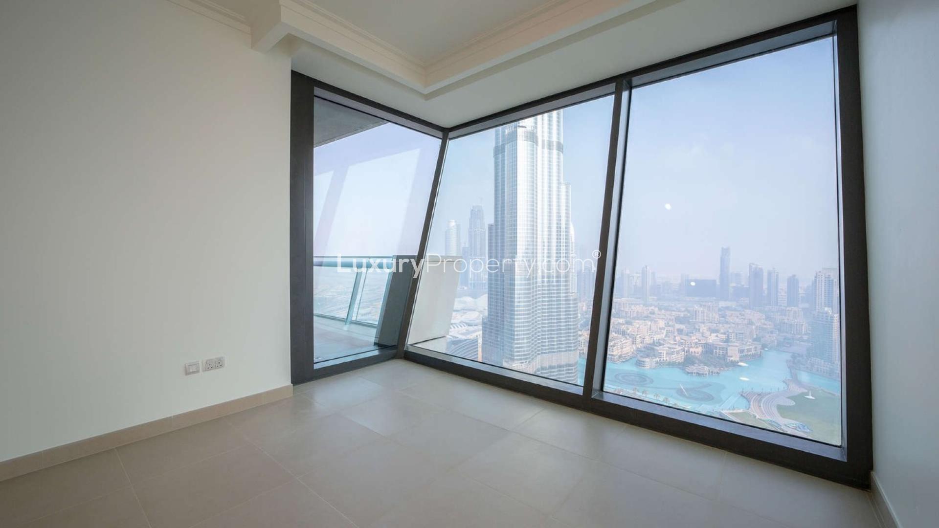 Stunning Burj Vista apartment view, Downtown Dubai skyline through large windows, for sale