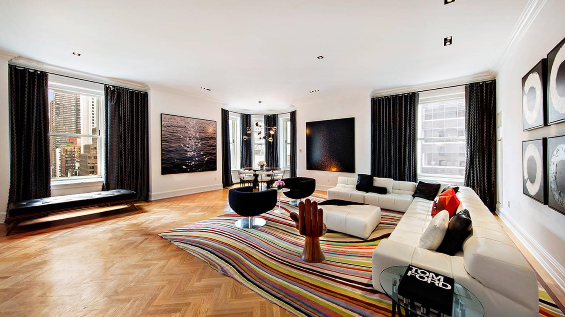 Luxurious living room in The Plaza Hotel Residences apartment, New York, with modern decor