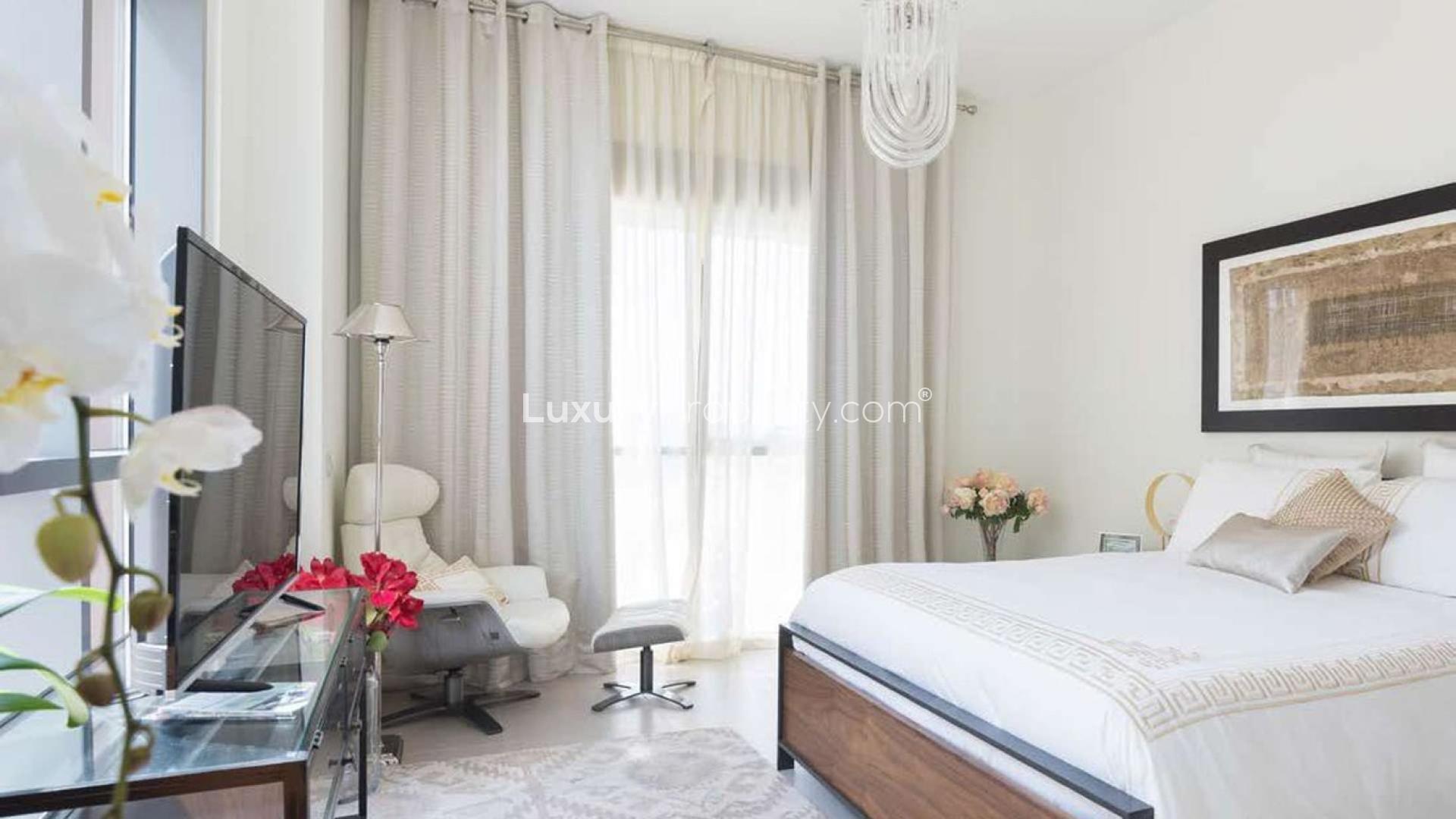 Cosy studio apartment interior with modern living and dining area in Dubai Wharf, Culture Village