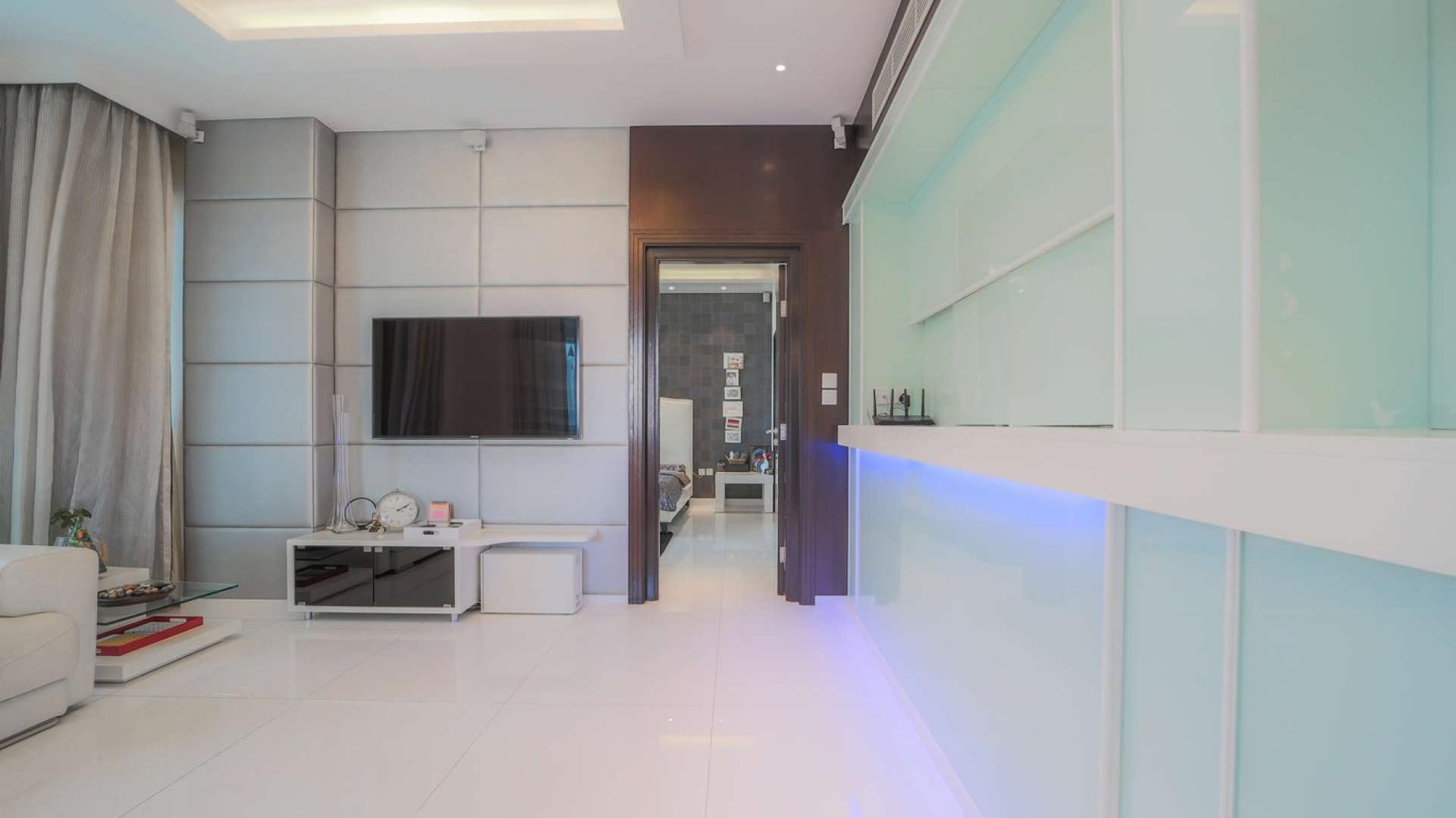 Modern living room in three-bedroom apartment at The Residences, Downtown Dubai