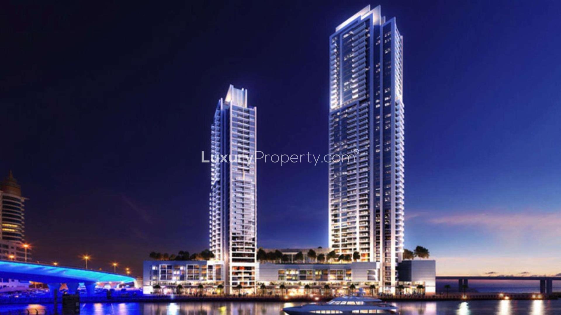 Luxury Dubai Marina apartment view with waterfront and city skyline at night