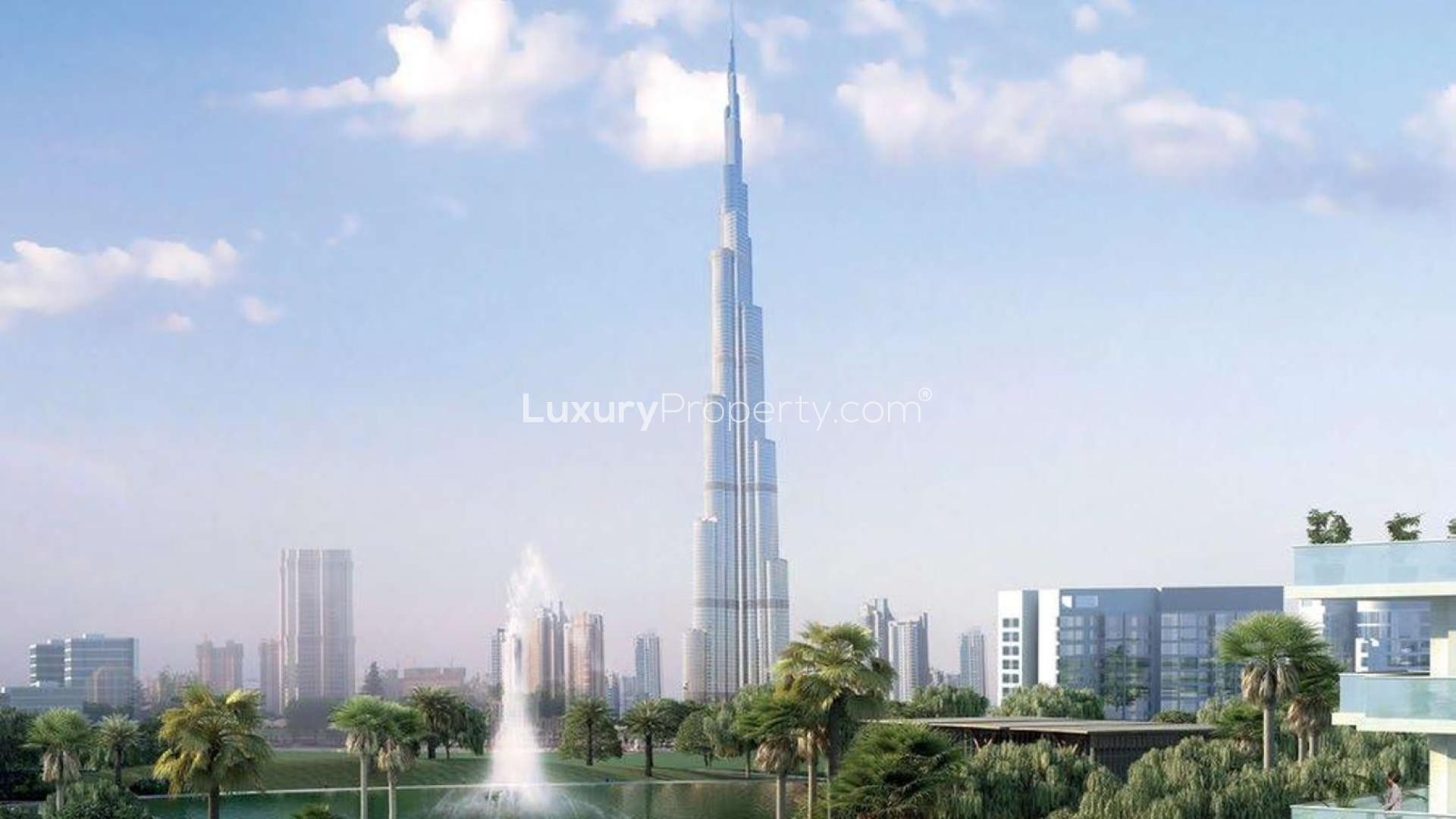 "Stunning view of Dubai skyline from luxury apartment at Golf Suites, Dubai Hills Estate.",Luxurious bedroom in Dubai Hills Estate apartment with modern decor and large window view
