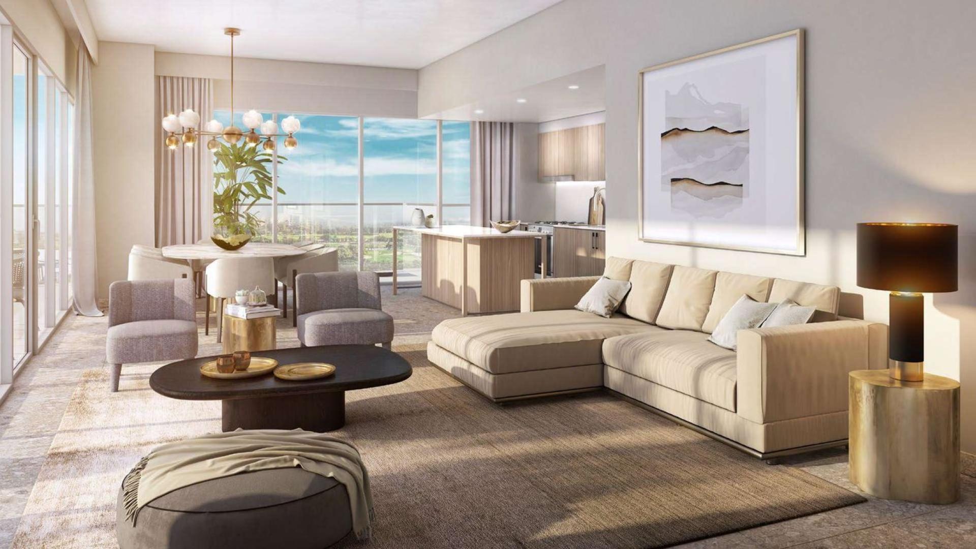 "Luxury apartment exterior at Golf Suites, Dubai Hills Estate with pool and greenery view.",Luxurious living room in three-bedroom apartment, Golf Suites, Dubai Hills Estate