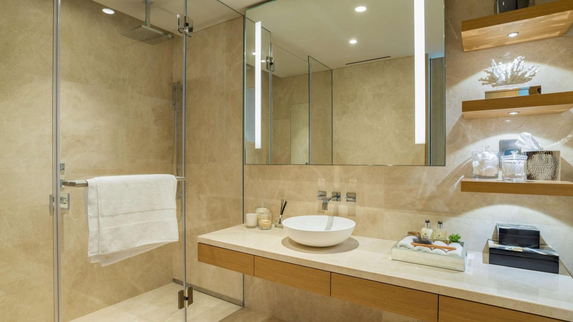 Modern living area in luxury apartment, One Palm, Palm Jumeirah with stylish kitchen design