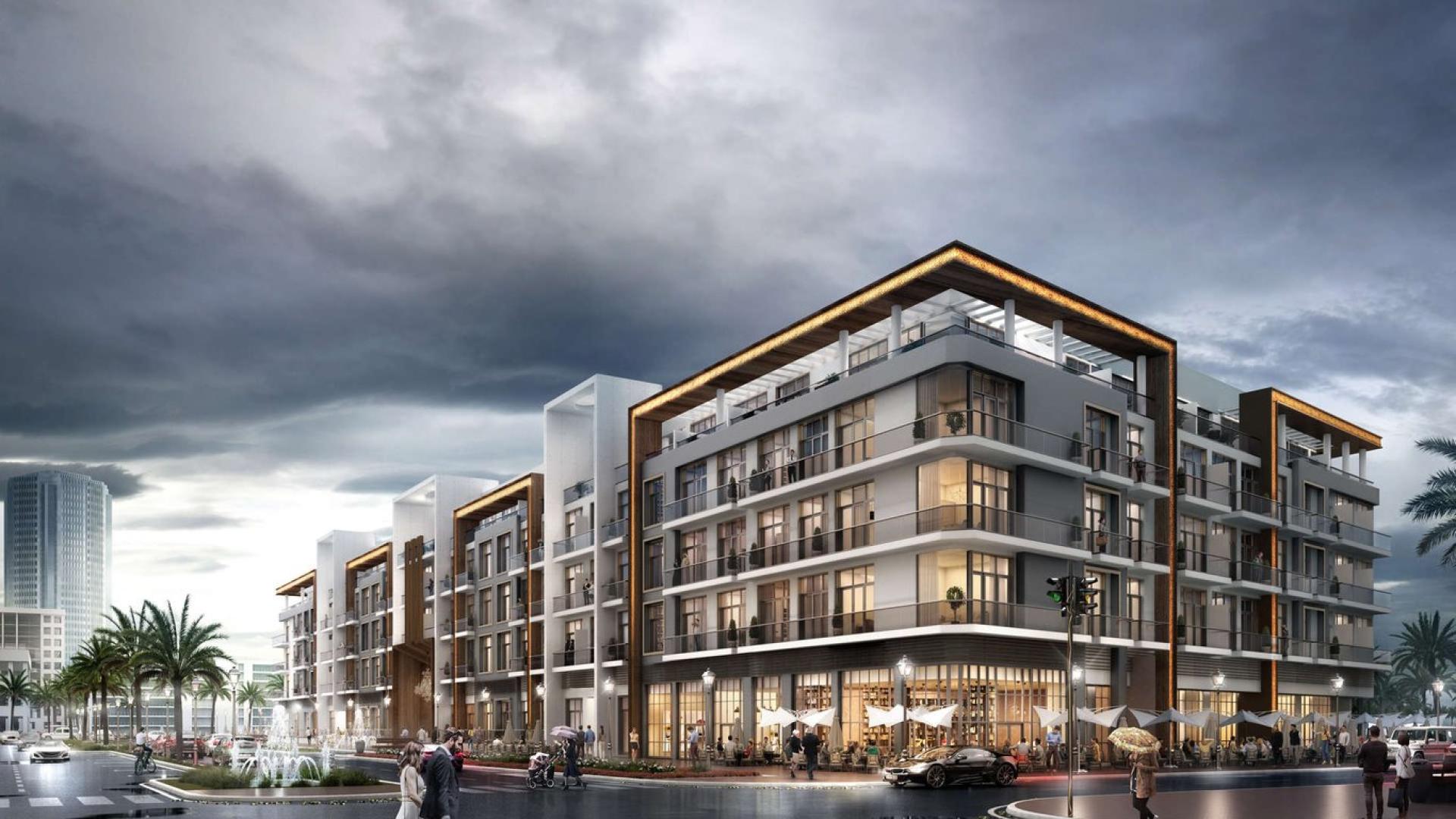 Exterior view of Pantheon Elysee apartment building in Jumeirah Village Circle, Dubai