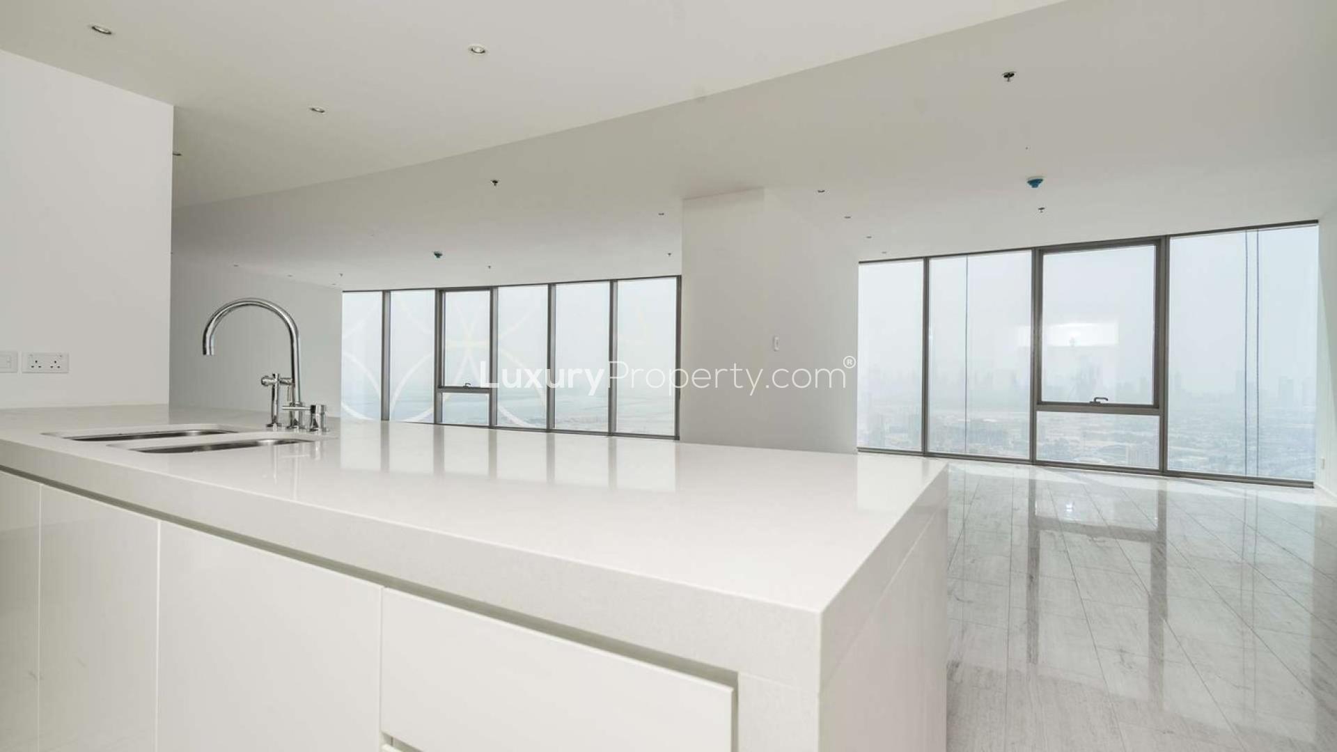 Spacious living room with large windows in D1 Tower apartment, Culture Village, Dubai