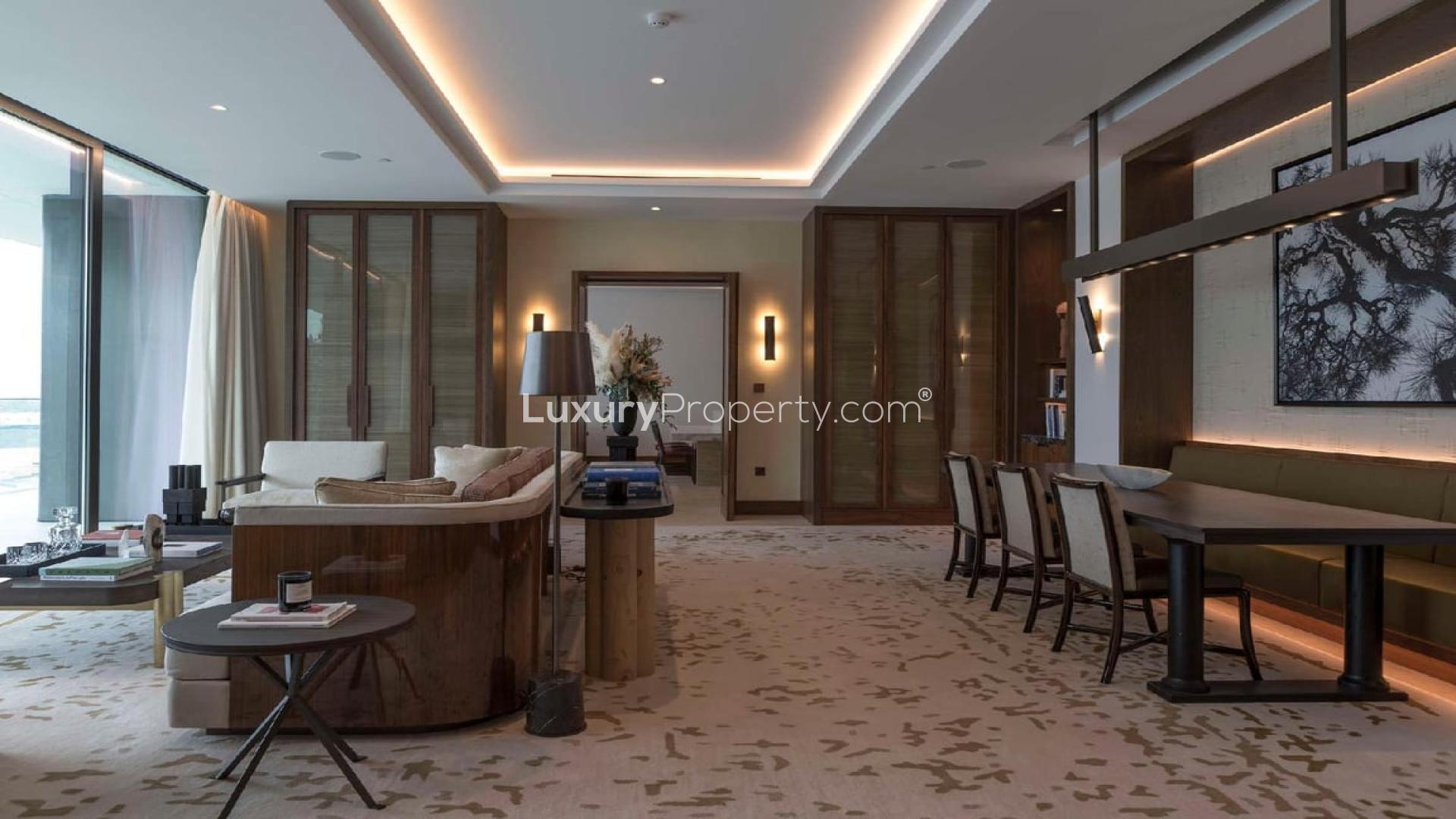 Luxurious living room in Dorchester Collection Dubai apartment, featuring modern decor and elegant furnishings