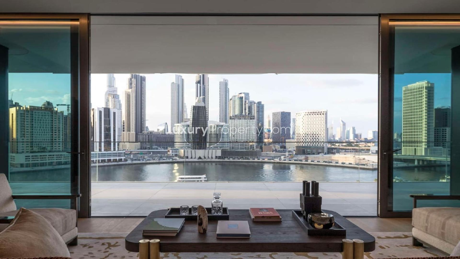 Luxurious apartment living room with stunning Business Bay skyline view, Dorchester Collection Dubai