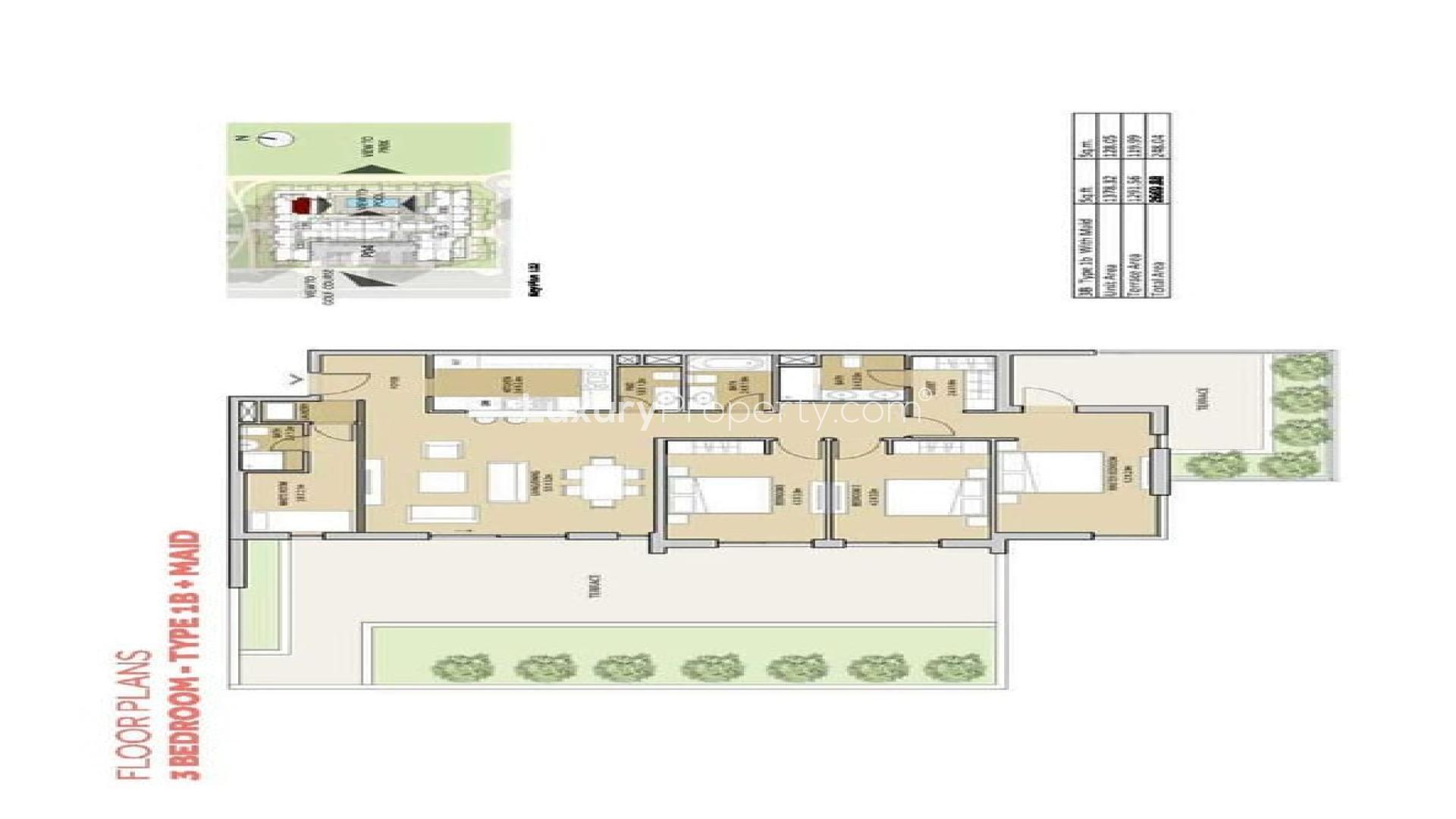 Modern kitchen in Mudon Views apartment, featuring sleek white cabinets and gray tile backsplash