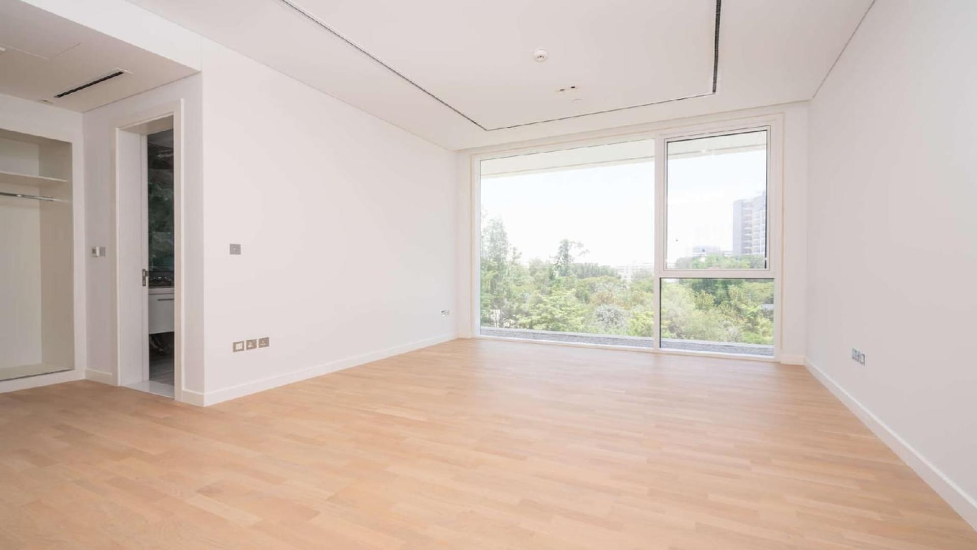 Modern kitchen in luxury Al Barari apartment for sale, Seventh Heaven community