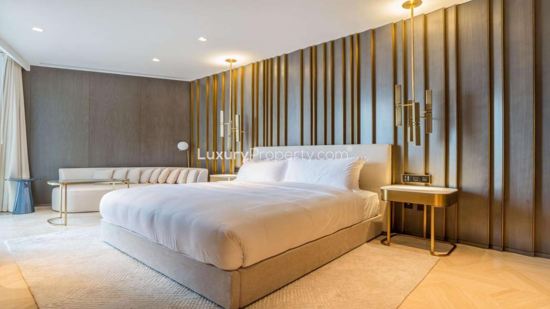 Luxury furnished bedroom with stunning skyline and sea view at FIVE Palm Jumeirah apartment
