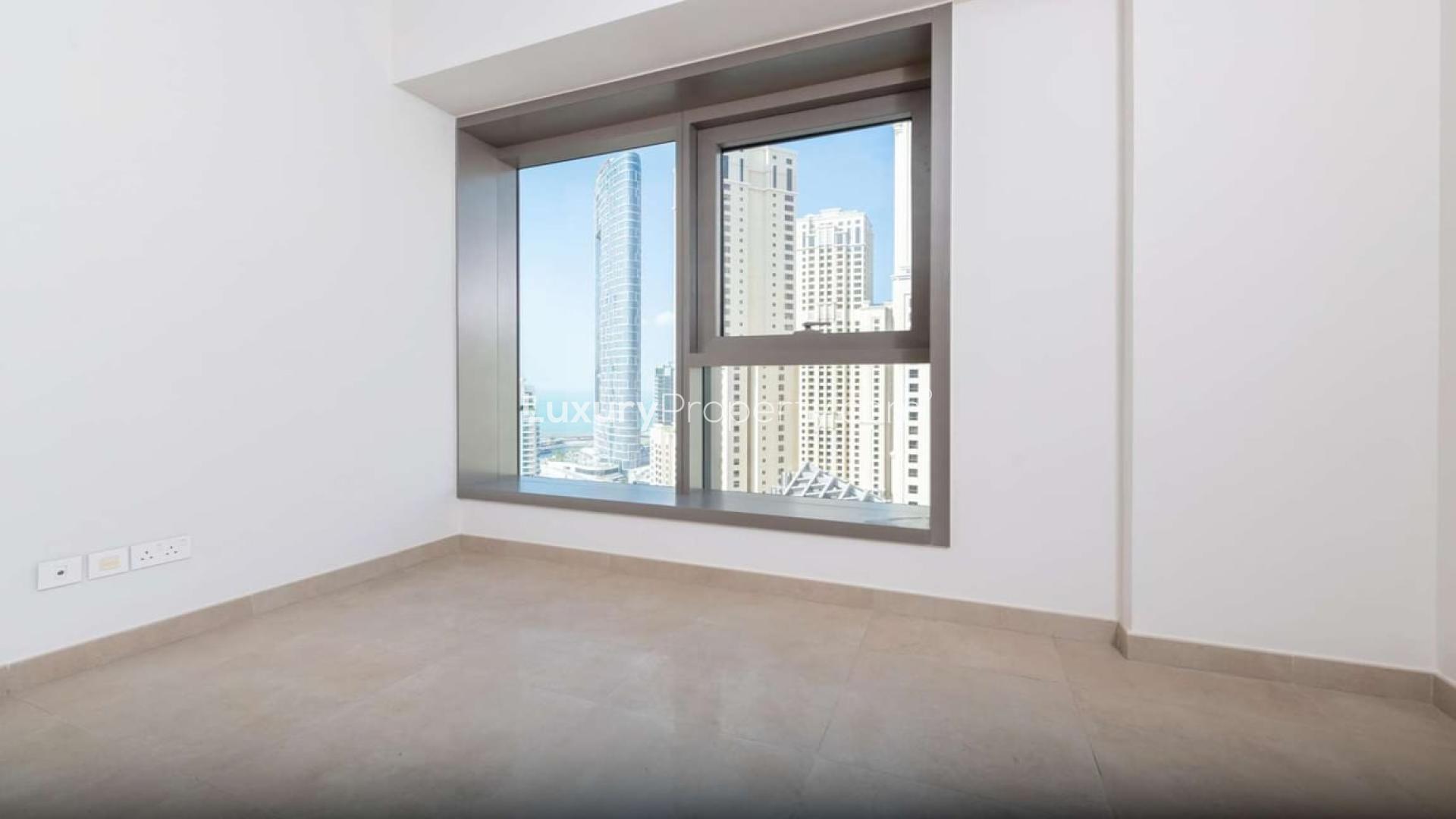 High-floor Sparkle Towers apartment with stunning Dubai Marina views through large windows