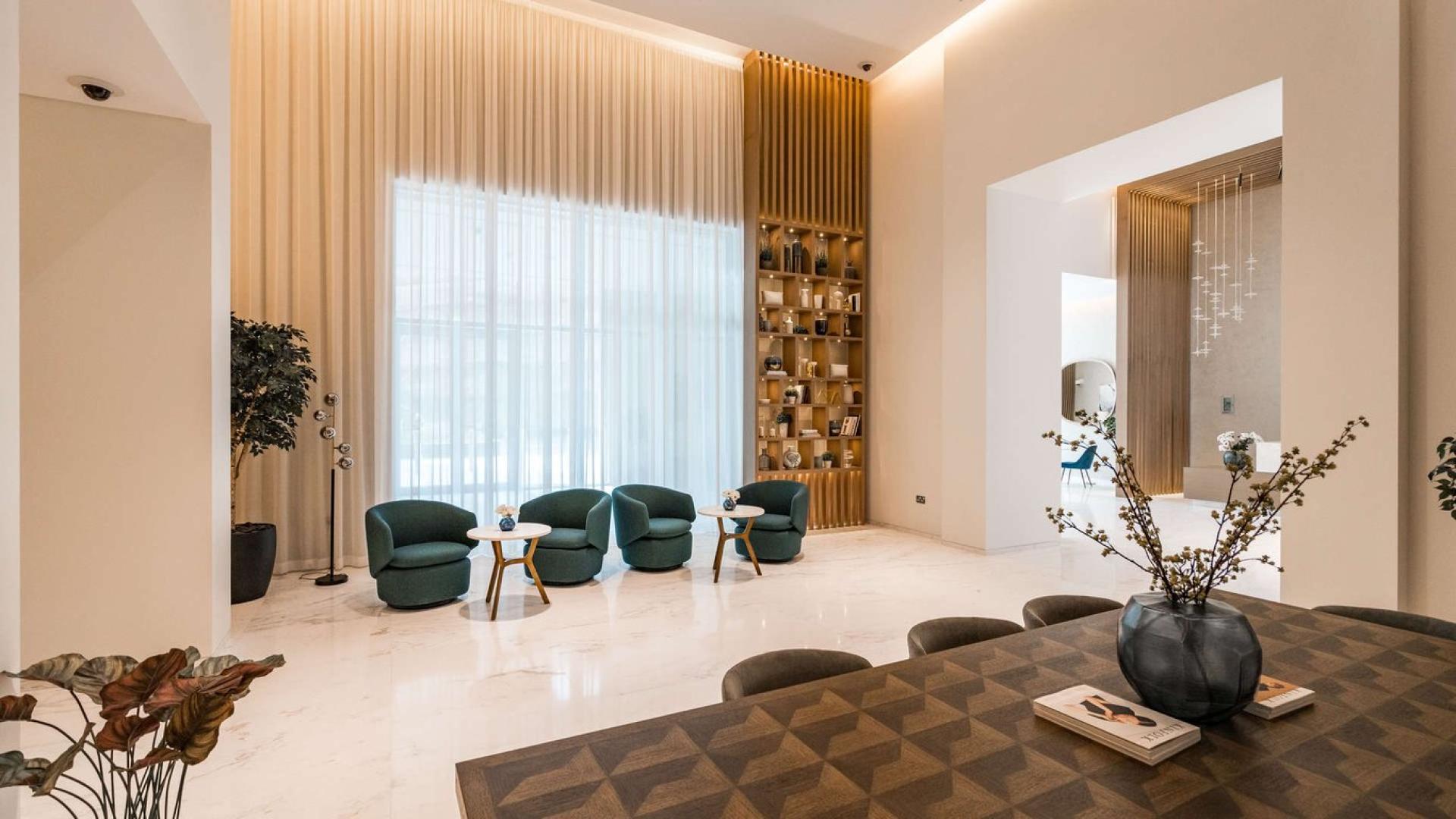 Luxurious living room in Boulevard Crescent apartment, Downtown Dubai, featuring elegant decor
